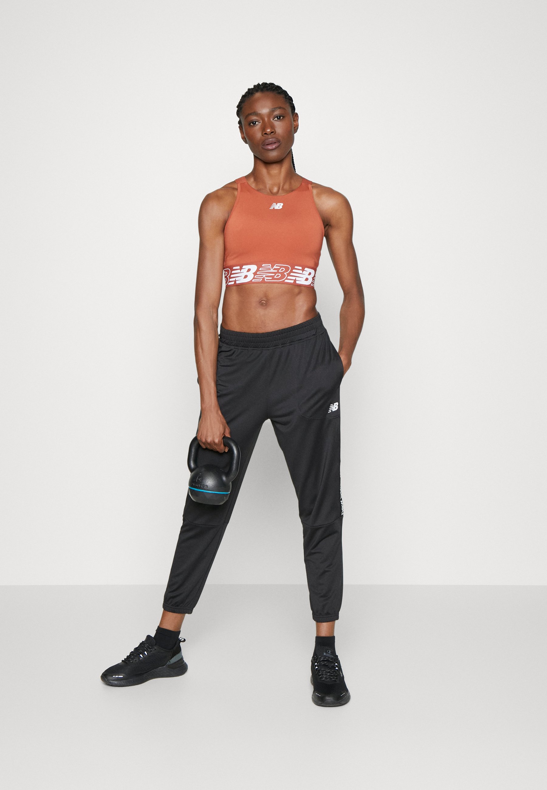 NB RELENTLESS JOGGER - Tracksuit bottoms - black