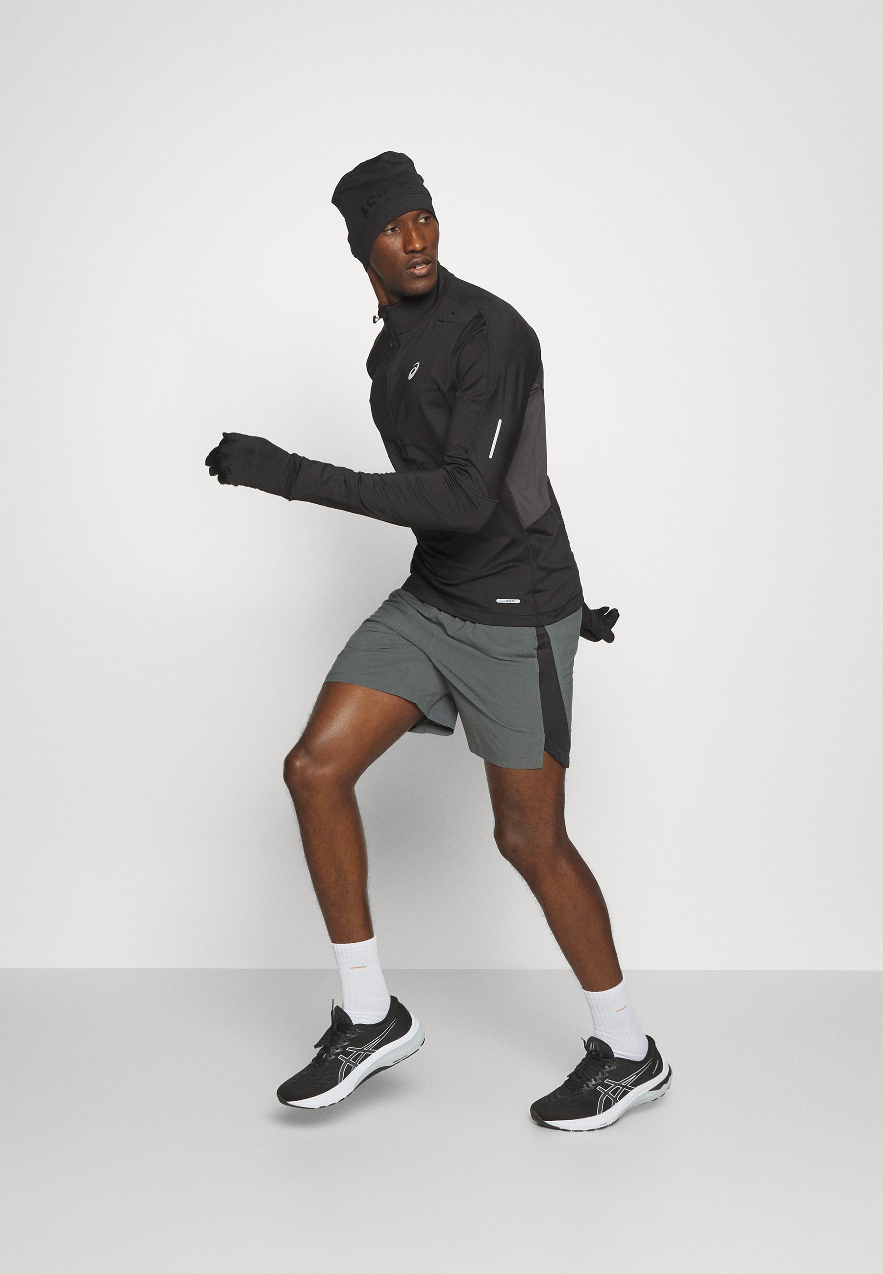 ASICS WINTER RUN 1/2 ZIP MIDLAYER - Long sleeved top - performance black/black