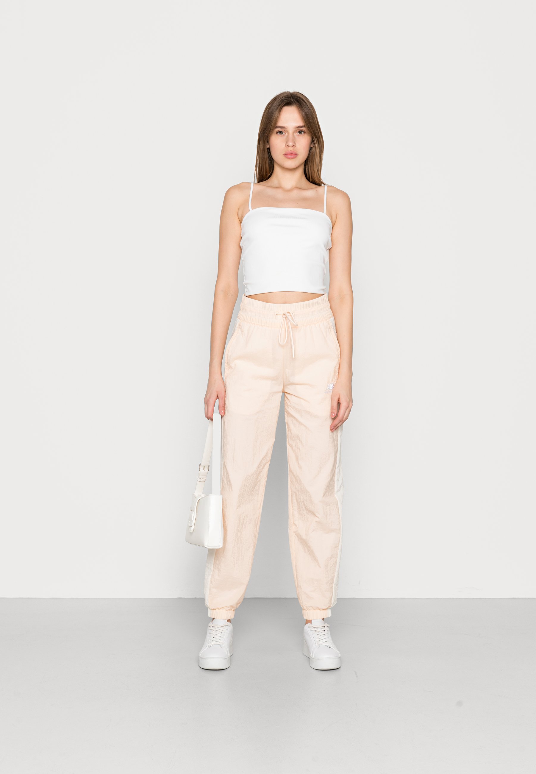 NB NB ATHLETICS AMPLIFIED PANT - Tracksuit bottoms - vintage rose/rose gold-coloured