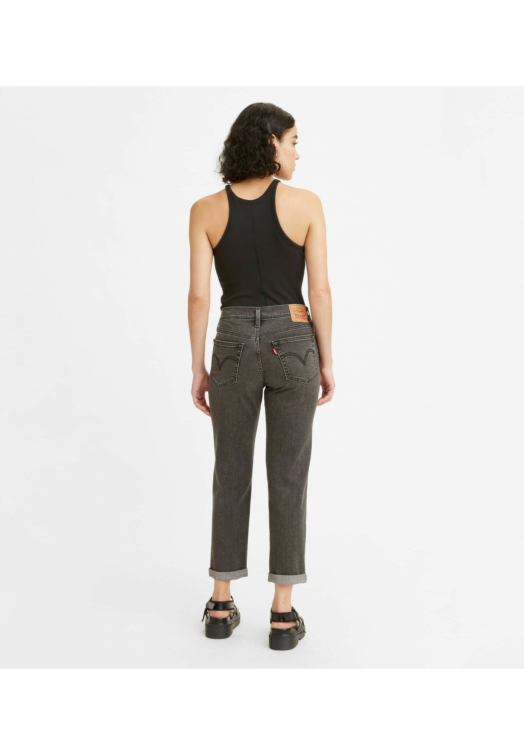 Levi's® MID RISE BOYFRIEND - Slim fit jeans - blacks/black denim