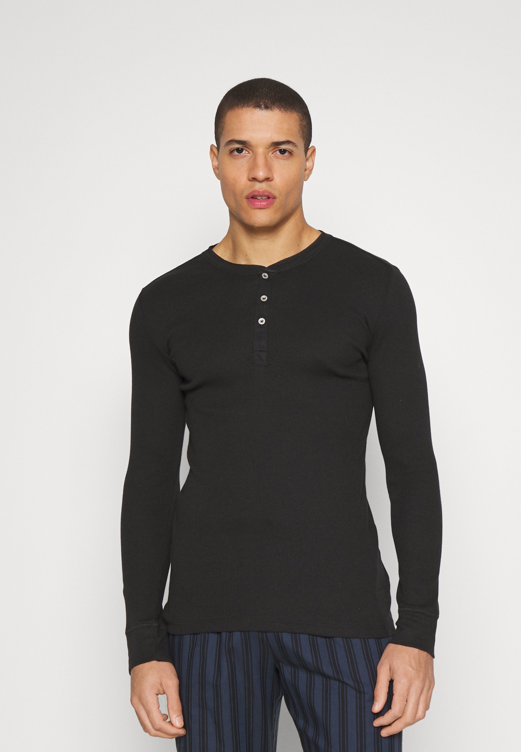 Levi's® LONG SLEEVE HENLEY - Pyjama top - black