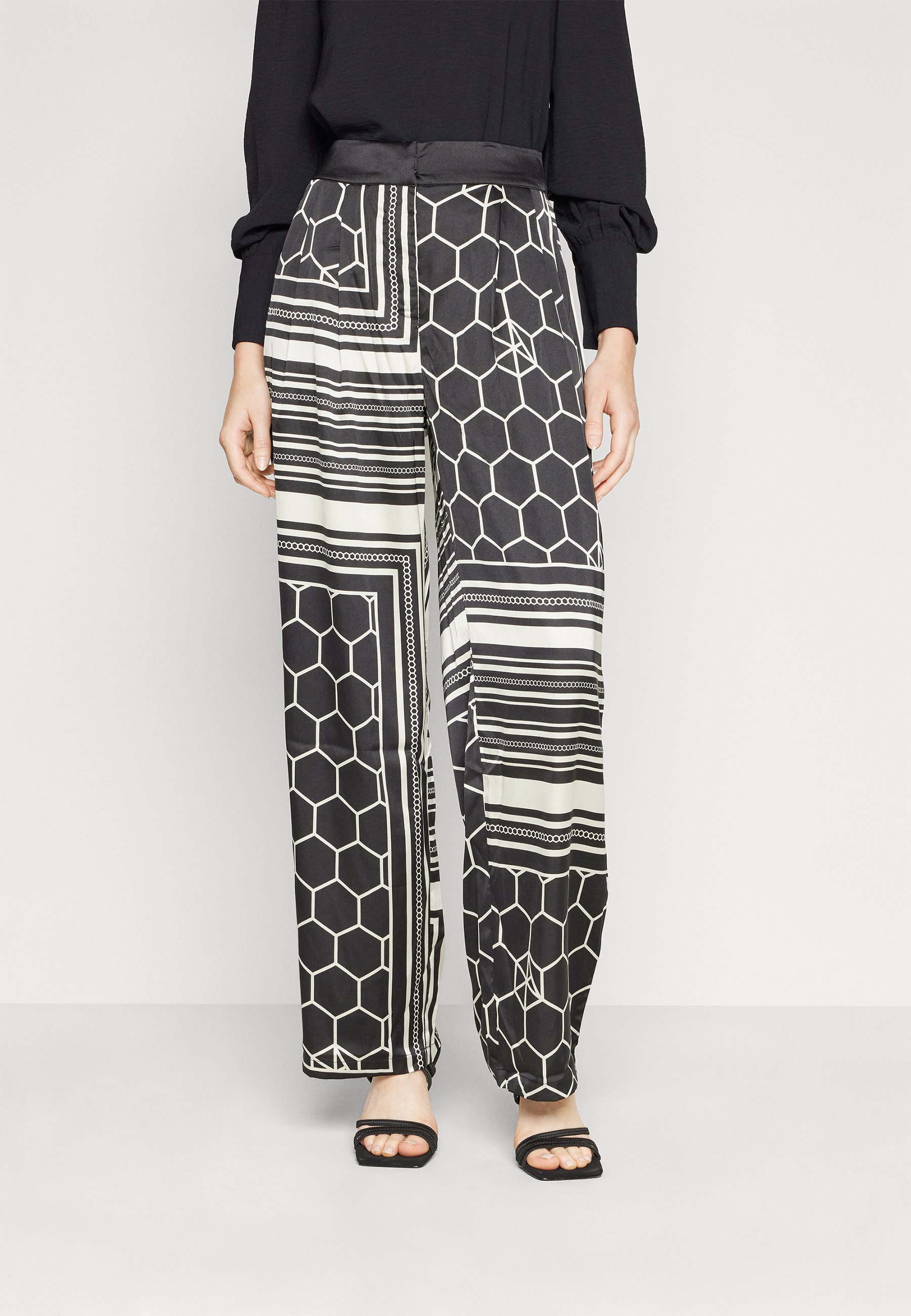 Vero Moda VMMALLE WIDE PANT - Trousers - black/bright white/black
