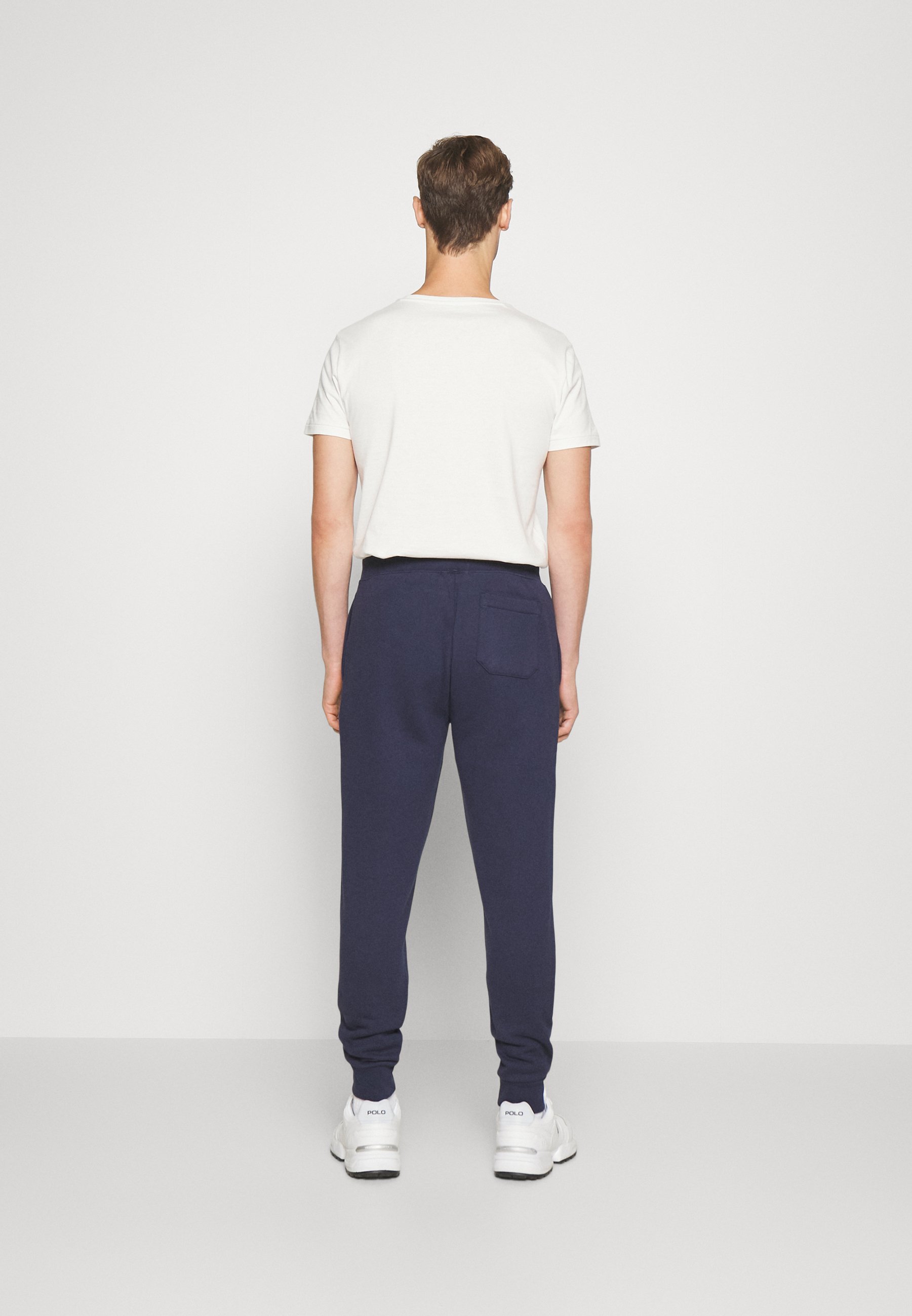 Polo Ralph Lauren ATHLETIC - Tracksuit bottoms - cruise navy/blue
