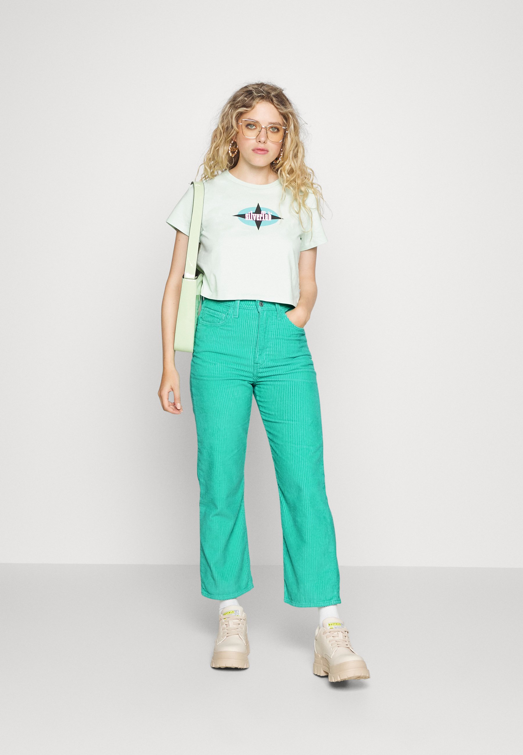 Levi's® CAGE STR ZIP ND - Trousers - electric green/green