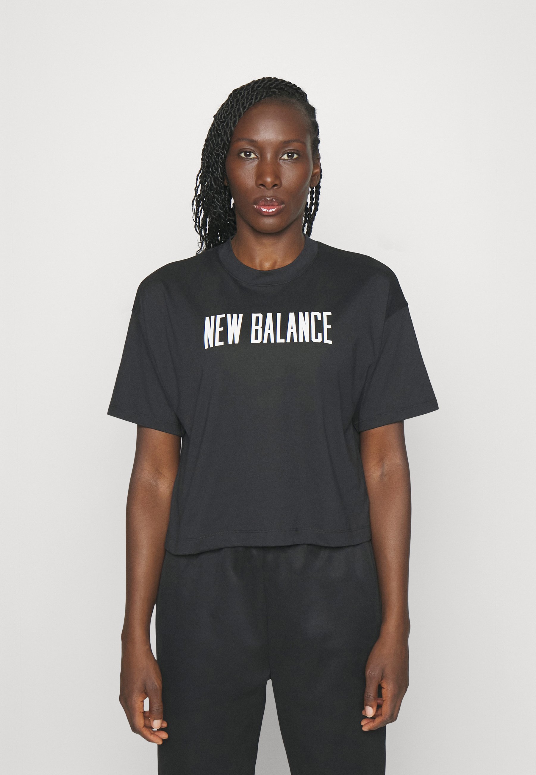 NB RELENTLESS HEATHERTECH - Print T-shirt - black (001)/black