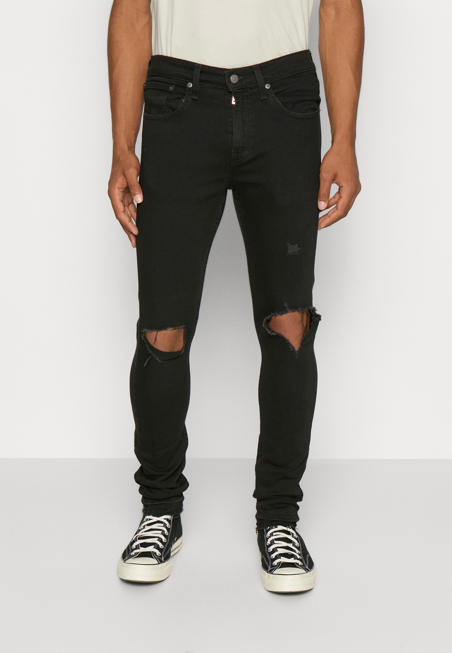 Levi's® SKINNY TAPER - Jeans Tapered Fit - black/black denim