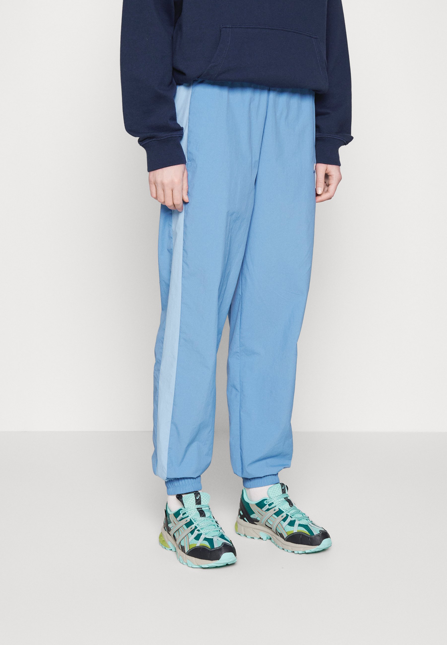 NB ATHLETICS REMASTERED PANT - Tracksuit bottoms - blue