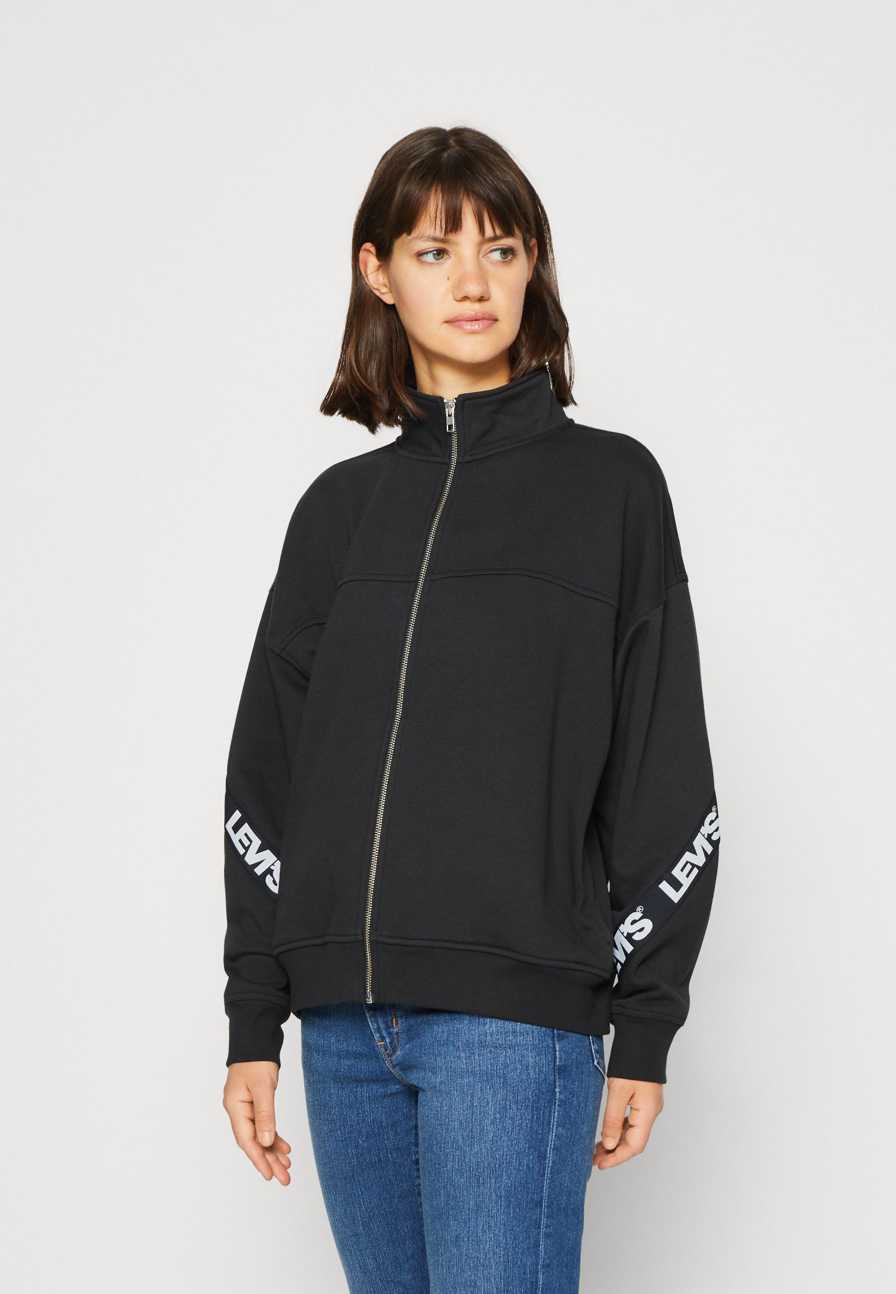 Levi's® TAPED FLEX ZIP - Zip-up sweatshirt - black