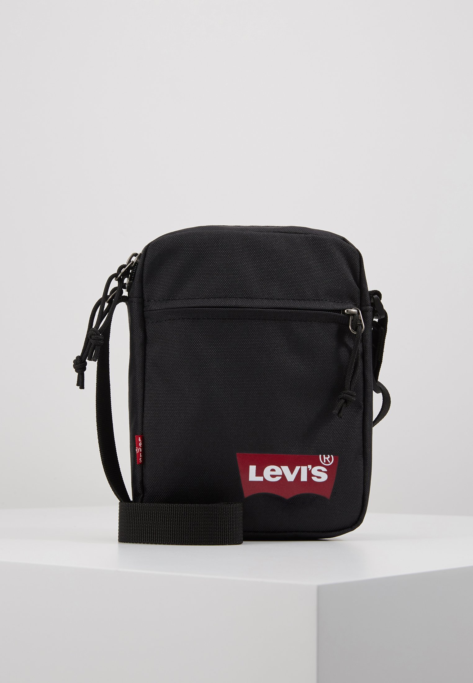 Levi's® MINI CROSSBODY SOLID BATWING - Across body bag - regular black/black