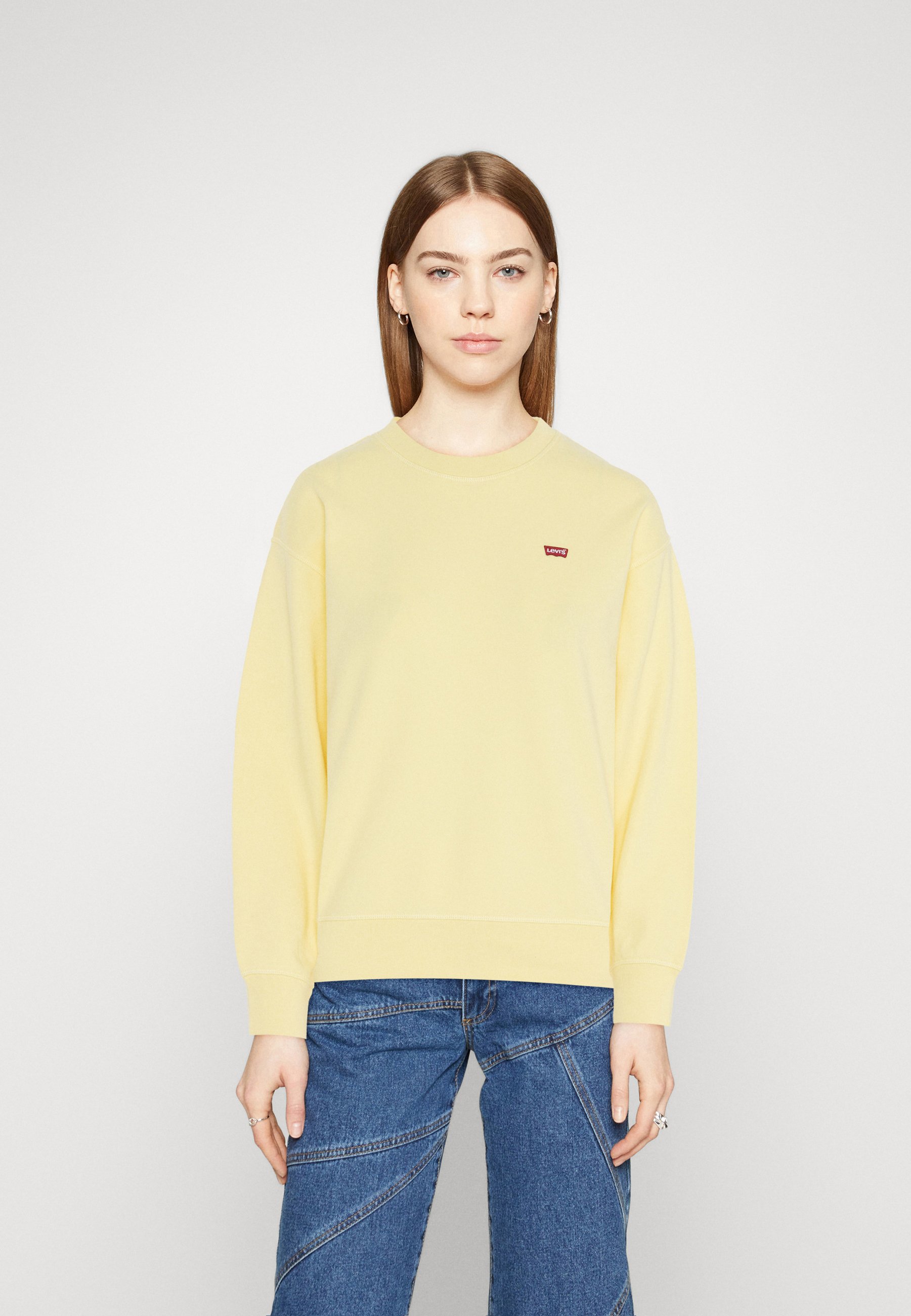 Levi's® STANDARD CREW - Sweatshirt - powdered yellow/yellow
