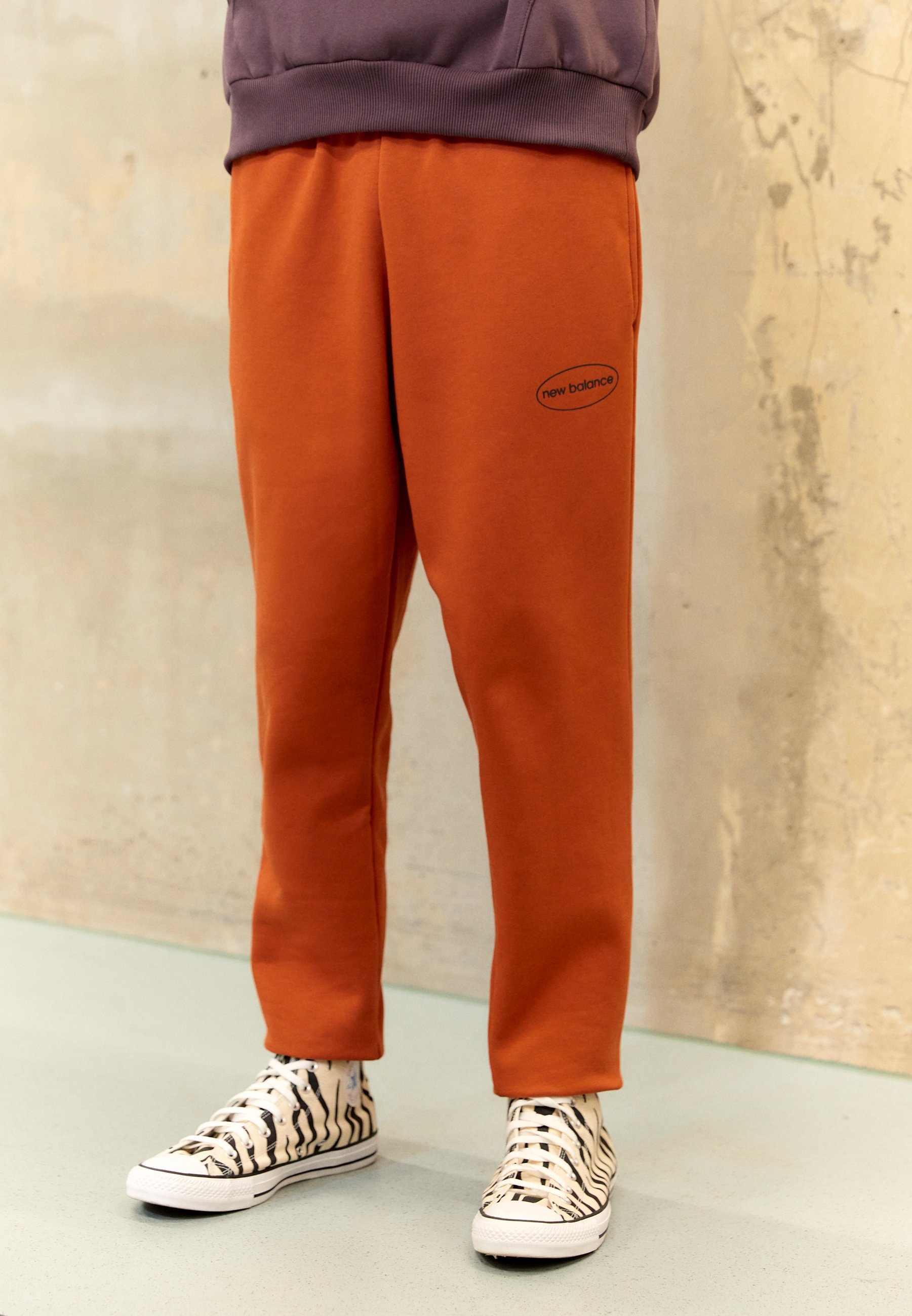 NB OVAL JOGGER - Tracksuit bottoms - rust oxyde/brown