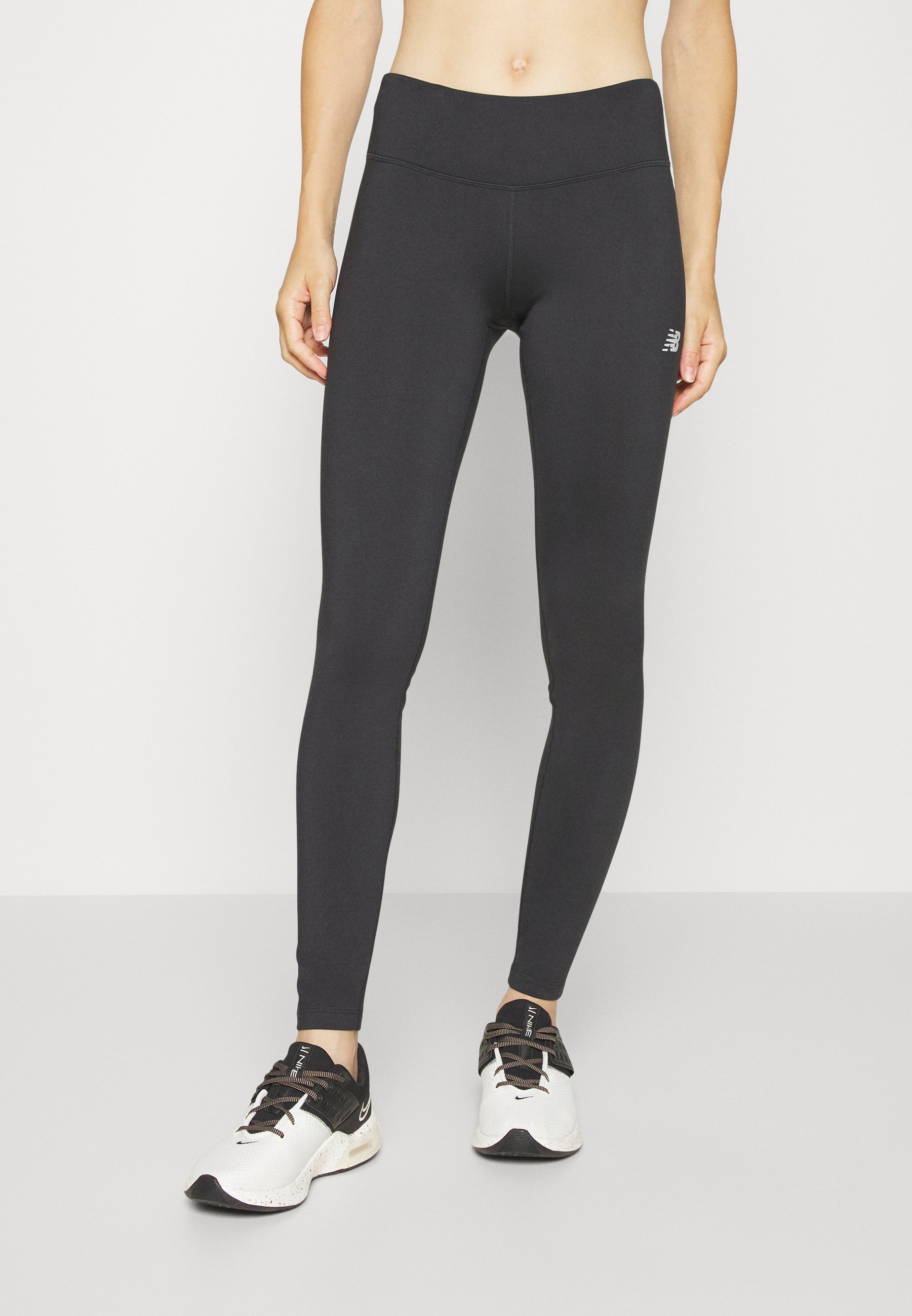 NB CORE RUN WINTER - Leggings - black