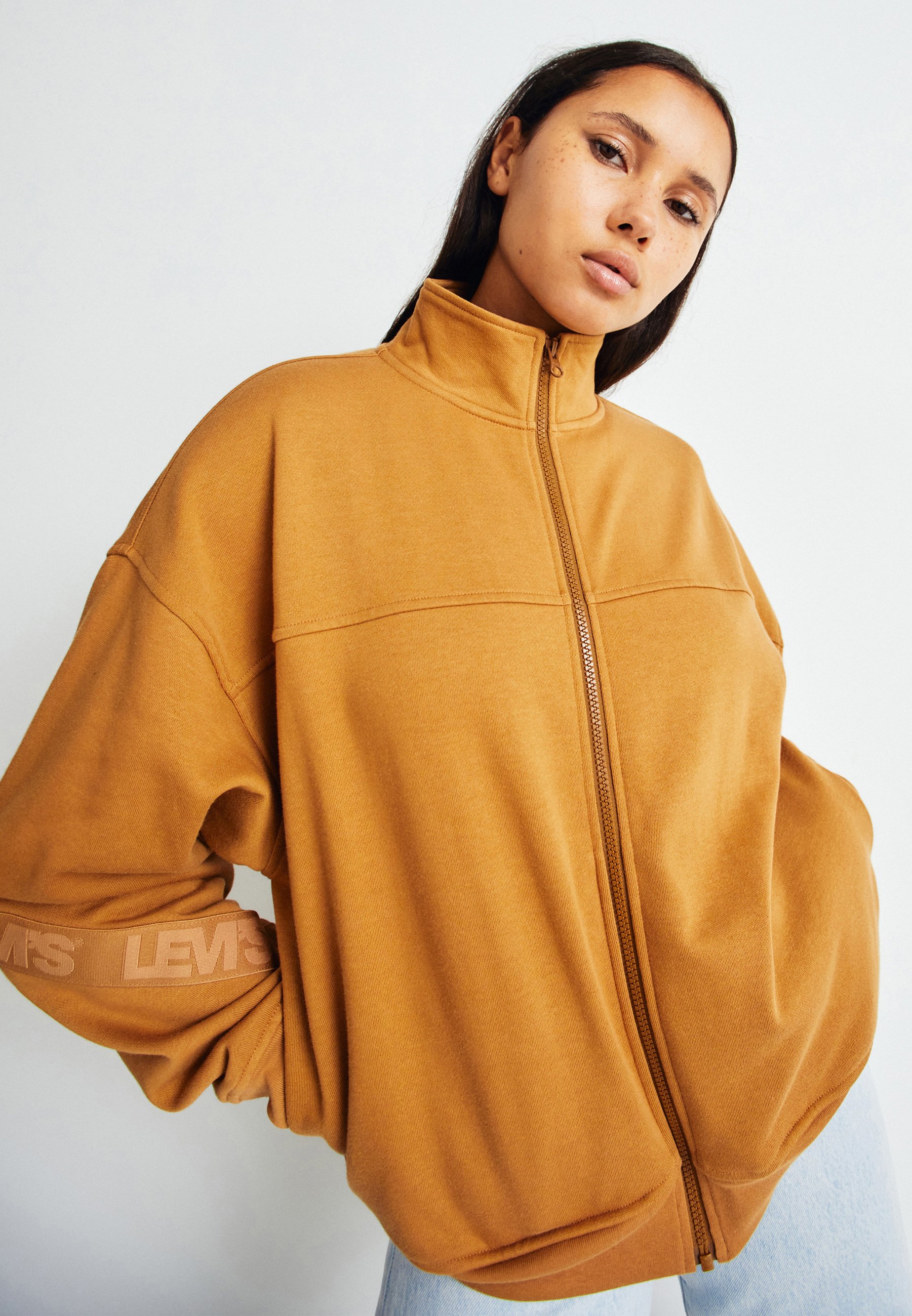 Levi's® TAPED FLEX ZIP - Zip-up sweatshirt - tan