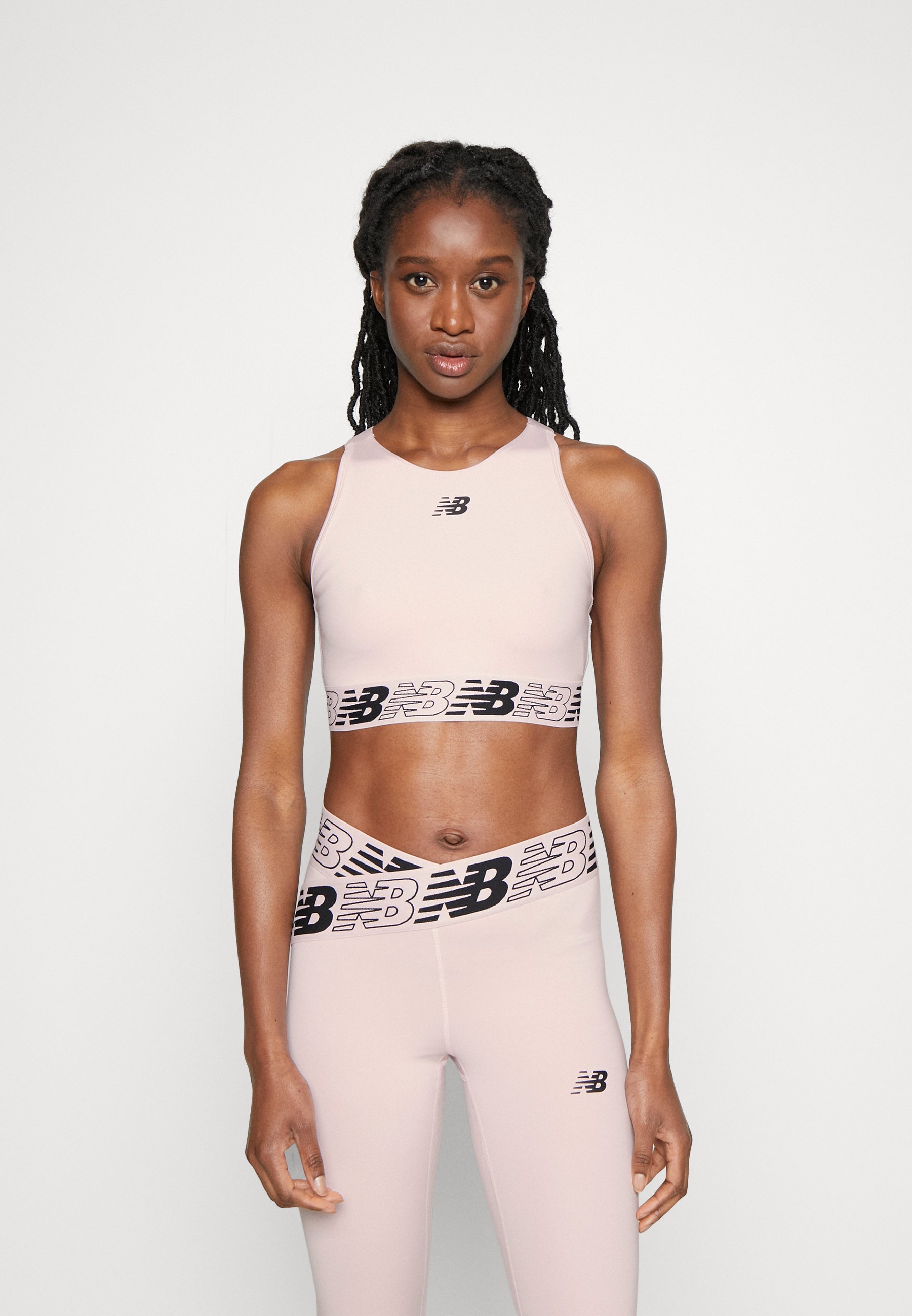 NB RELENTLESS CROP BRA - Medium support sports bra - stone pink/light pink