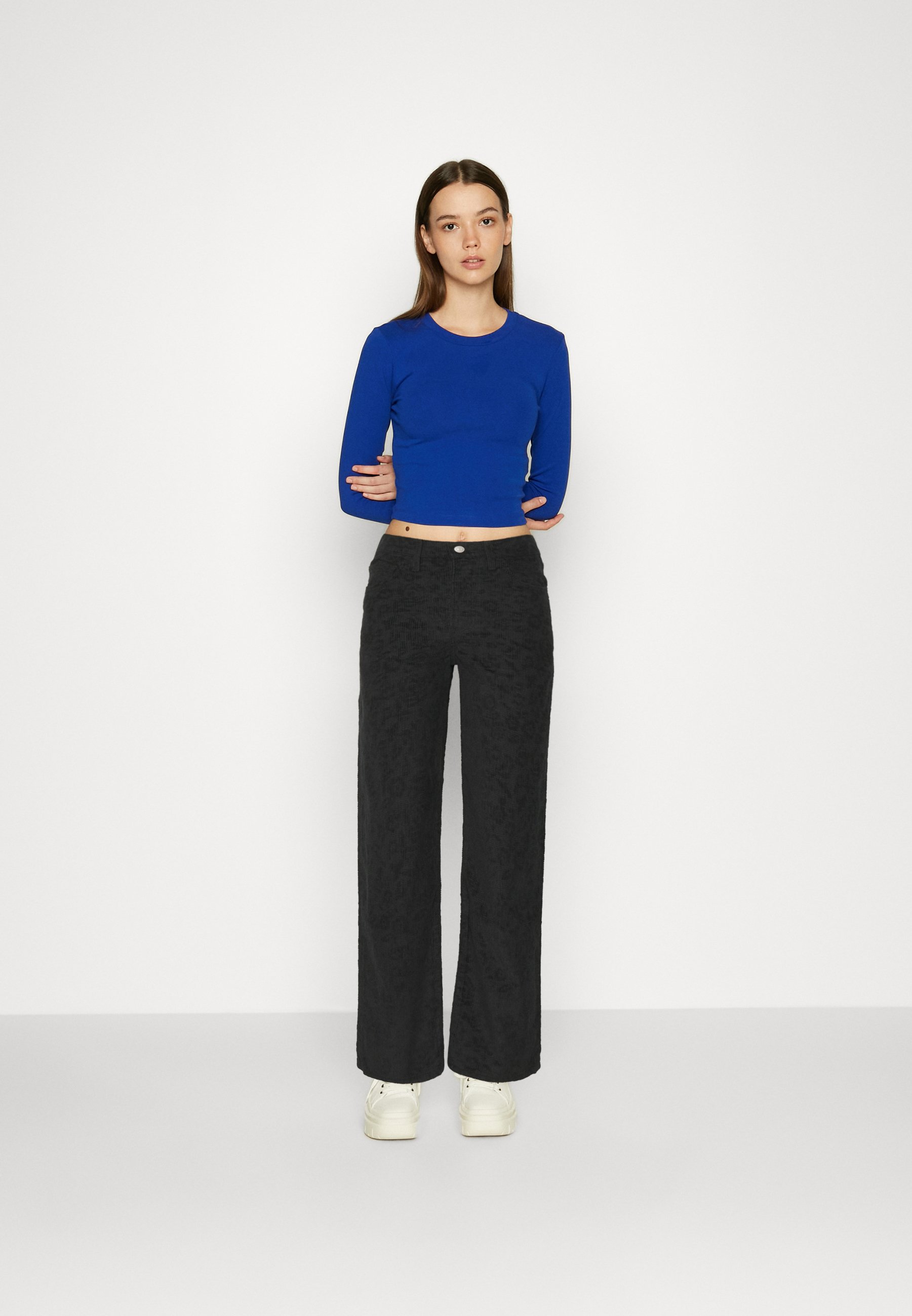 Levi's® CAGE STR ZIP ND - Trousers - caviar/black