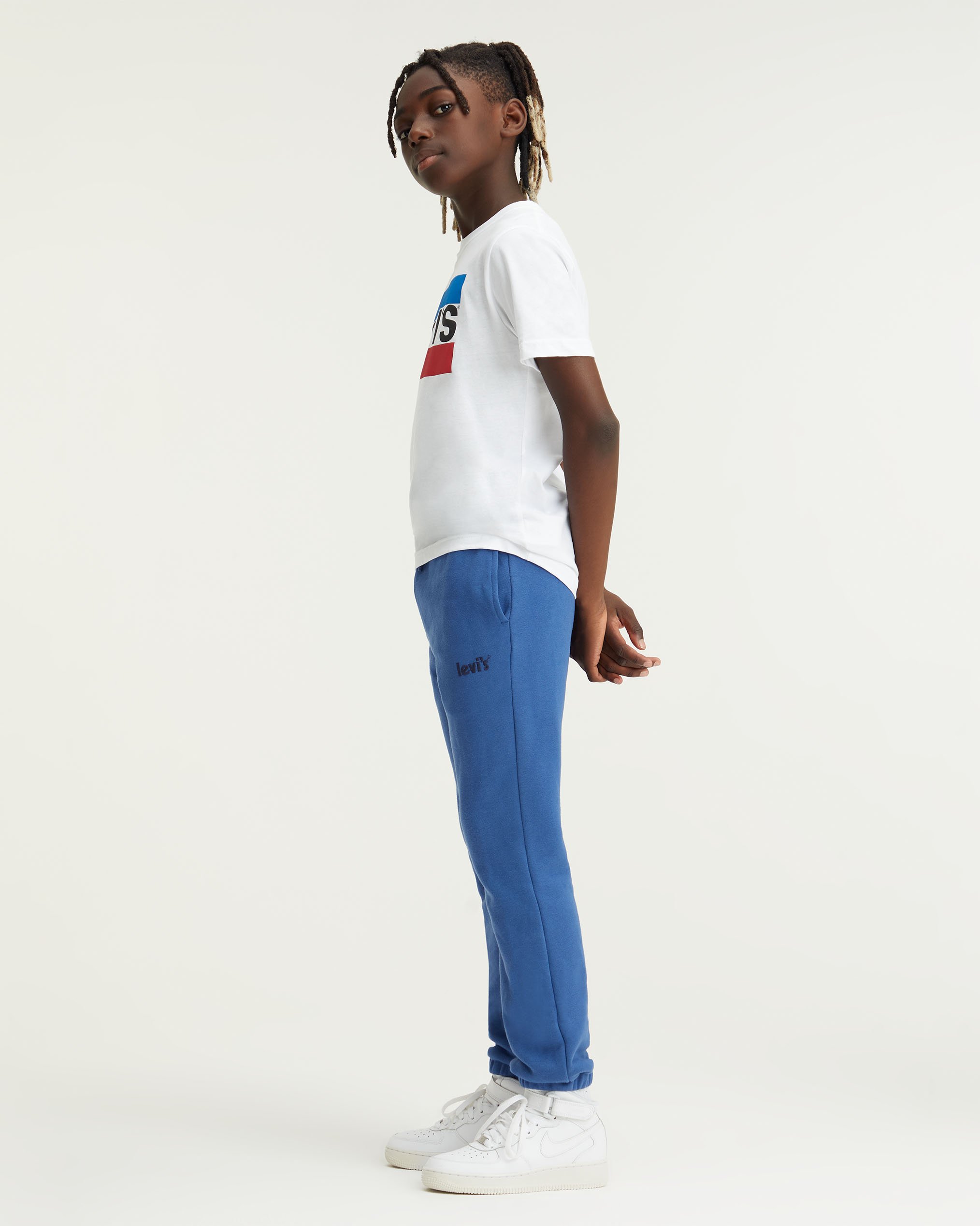 Levi's® POSTER LOGO RELAXED JOGGER - Tracksuit bottoms - true navy/dark blue
