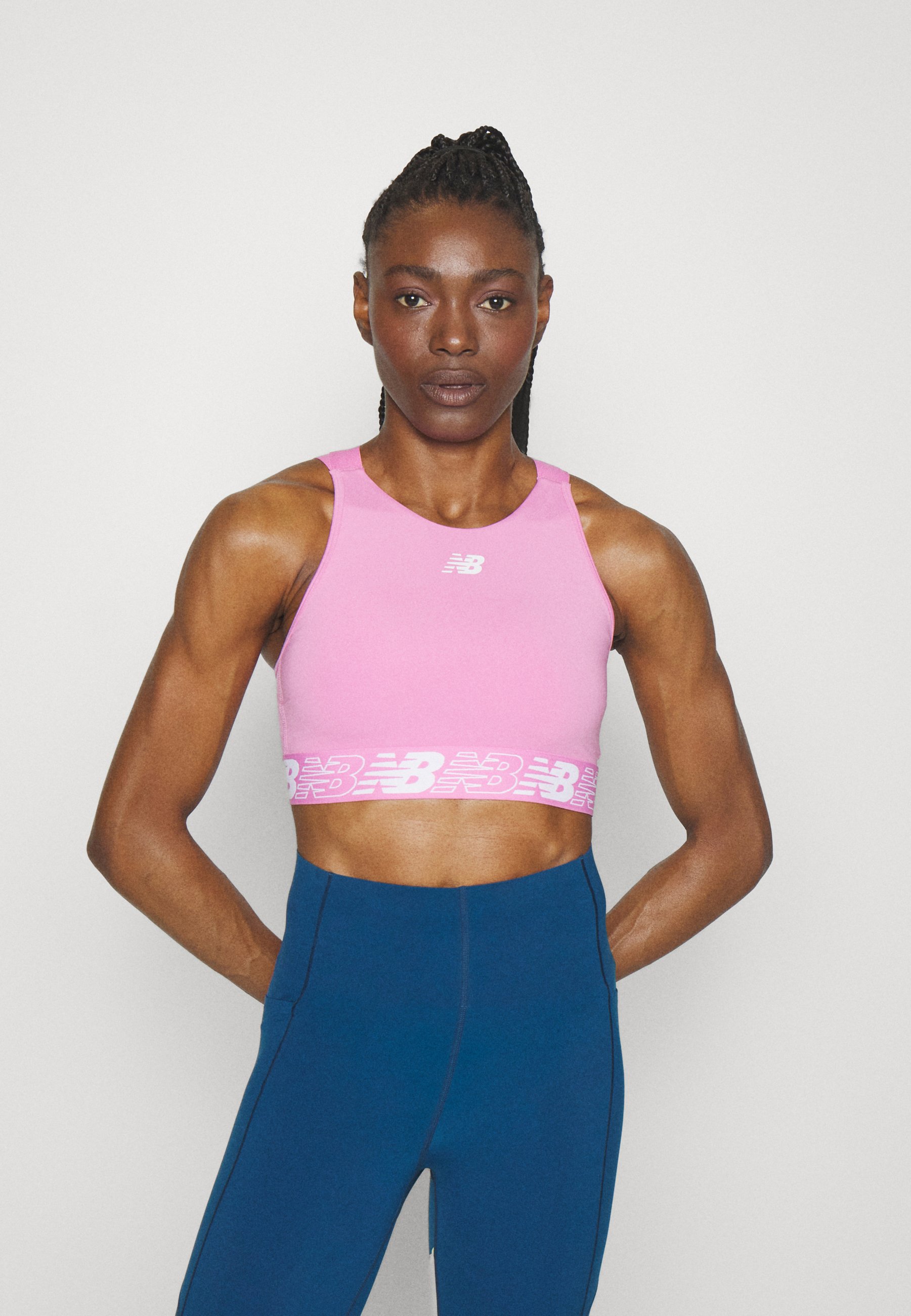 NB RELENTLESS CROP BRA - Medium support sports bra - raspberry/pink
