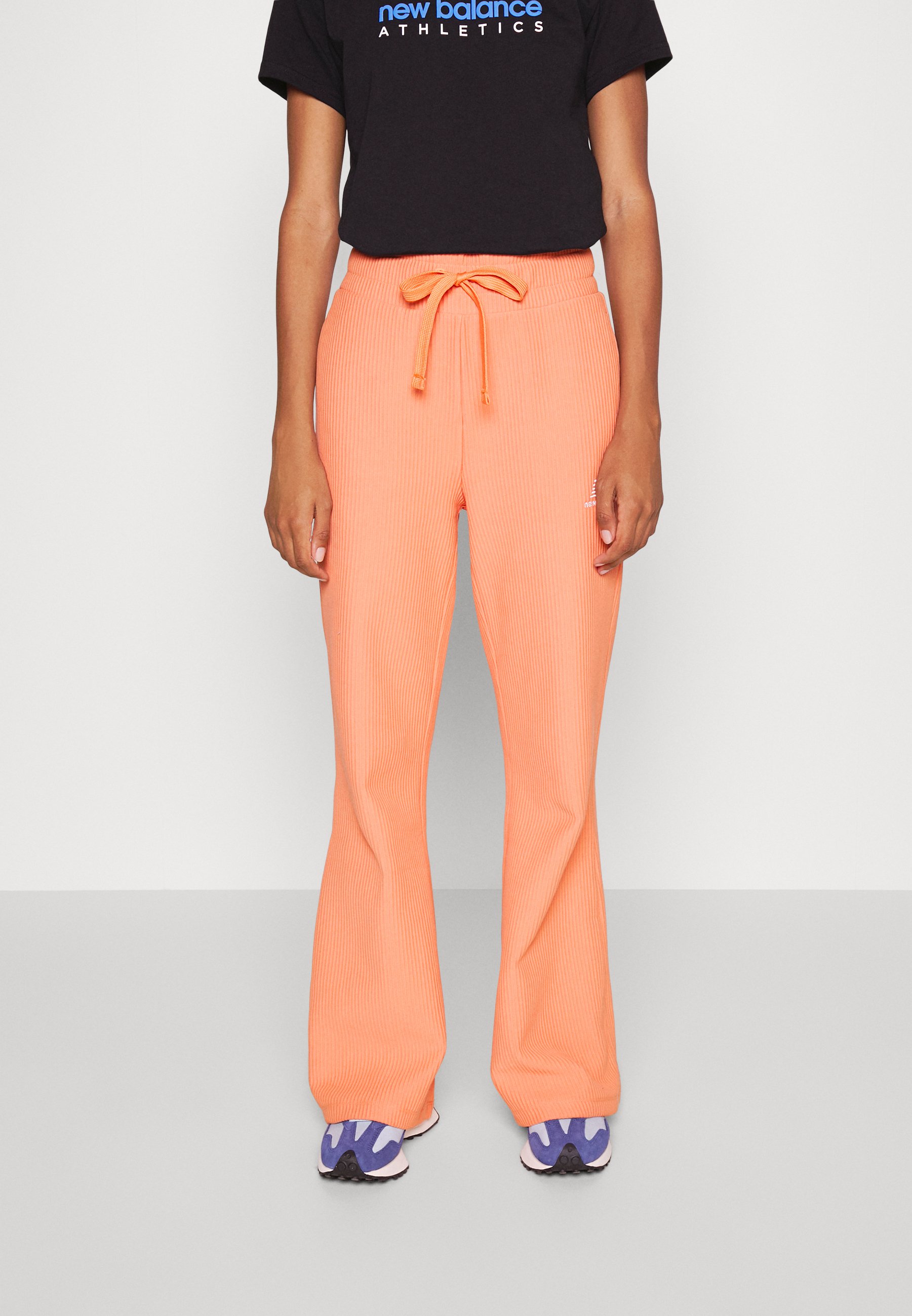 NB ATHLETICS TRACK PANT - Tracksuit bottoms - cedar/orange