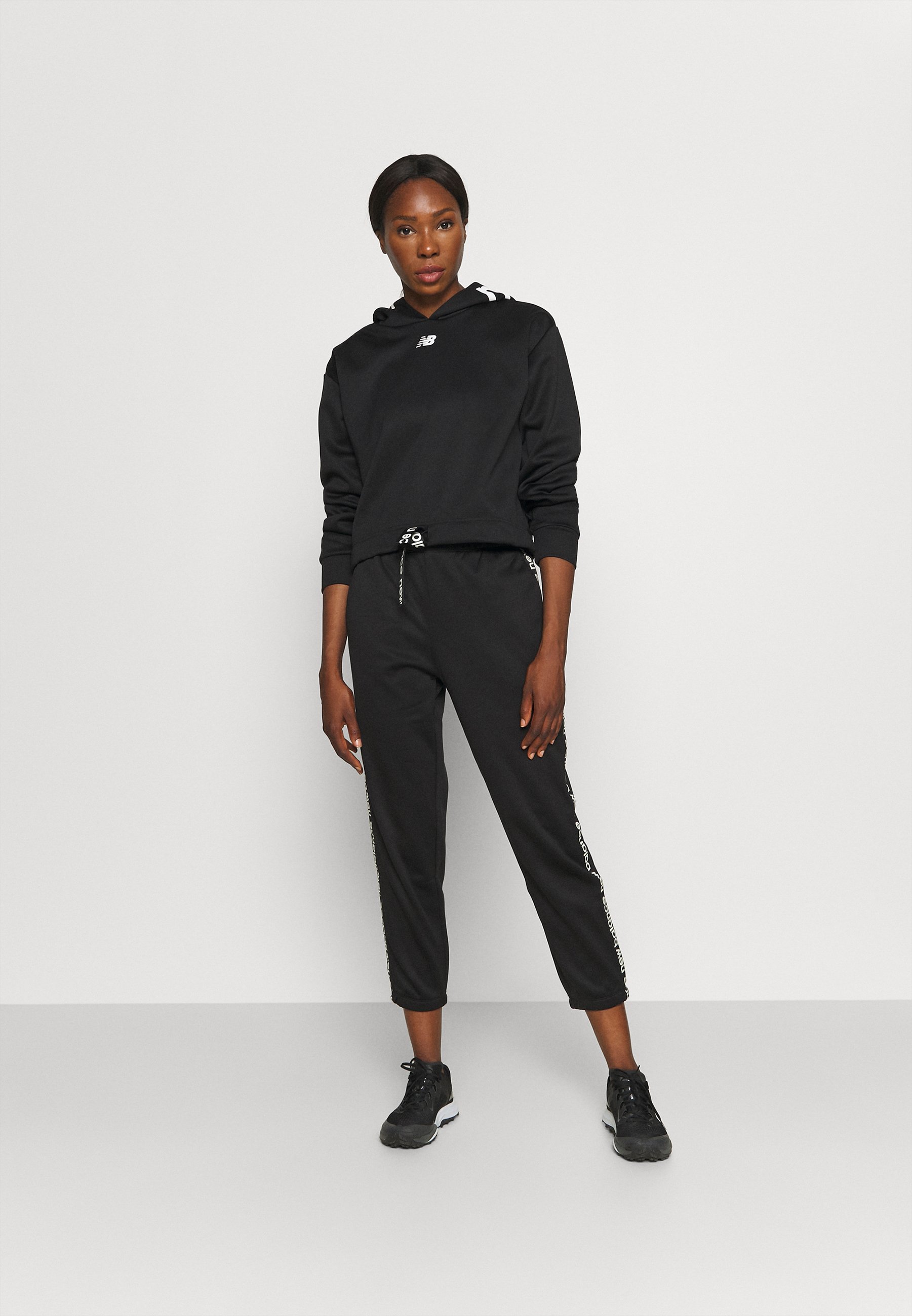 NB RELENTLESS PERFORMANCE  - Tracksuit bottoms - black/black