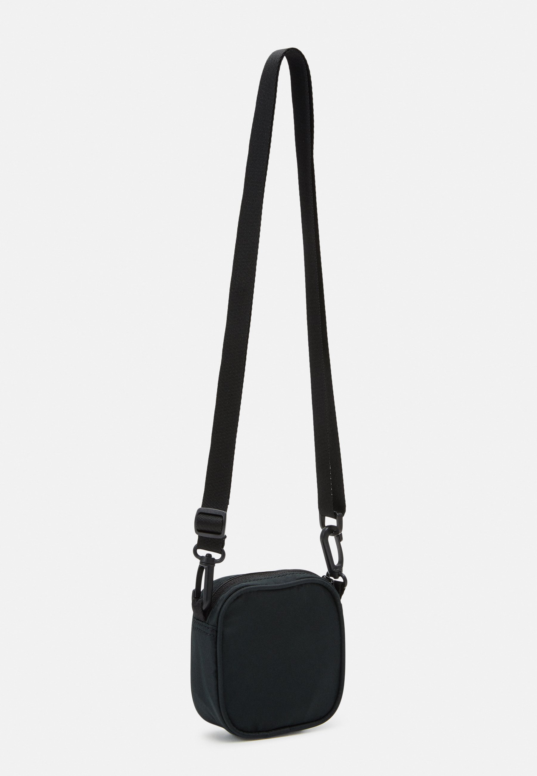 Converse FLOATING POCKET SEASONAL POUCH UNISEX - Across body bag - black