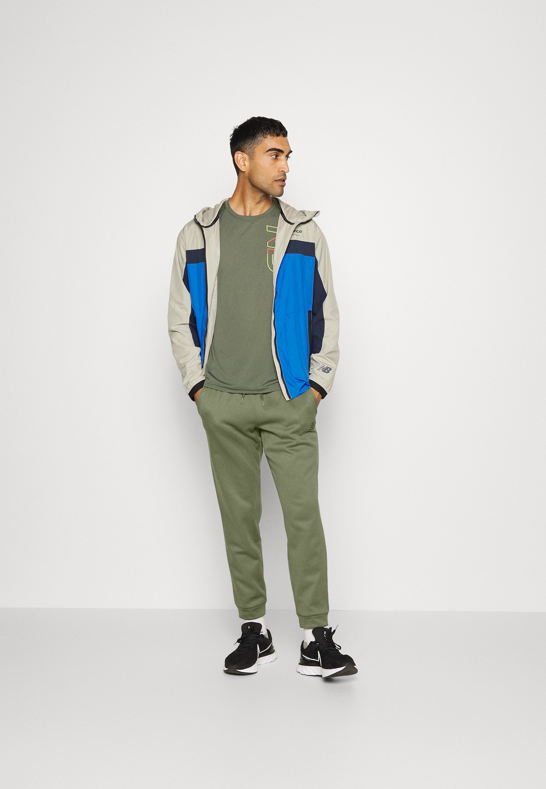 NB TENACITY PERFORMANCE - Tracksuit bottoms - deep olive green/olive