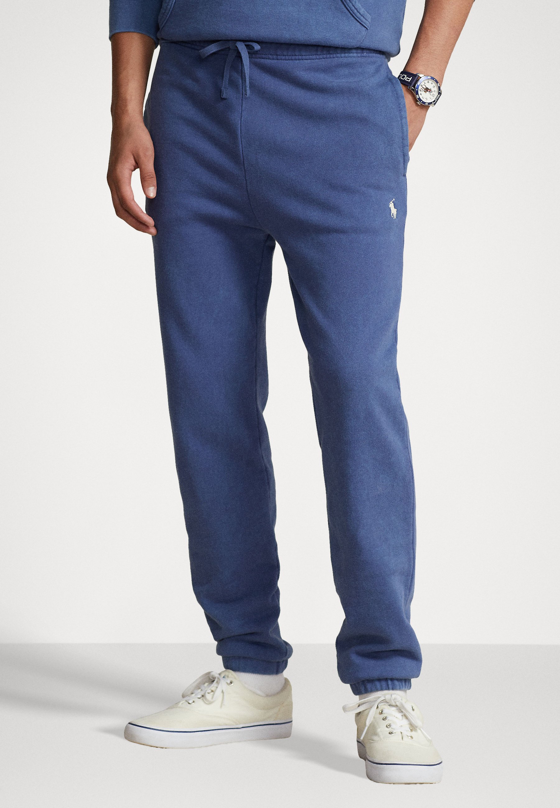 Polo Ralph Lauren ATHLETIC - Tracksuit bottoms - light navy/blue