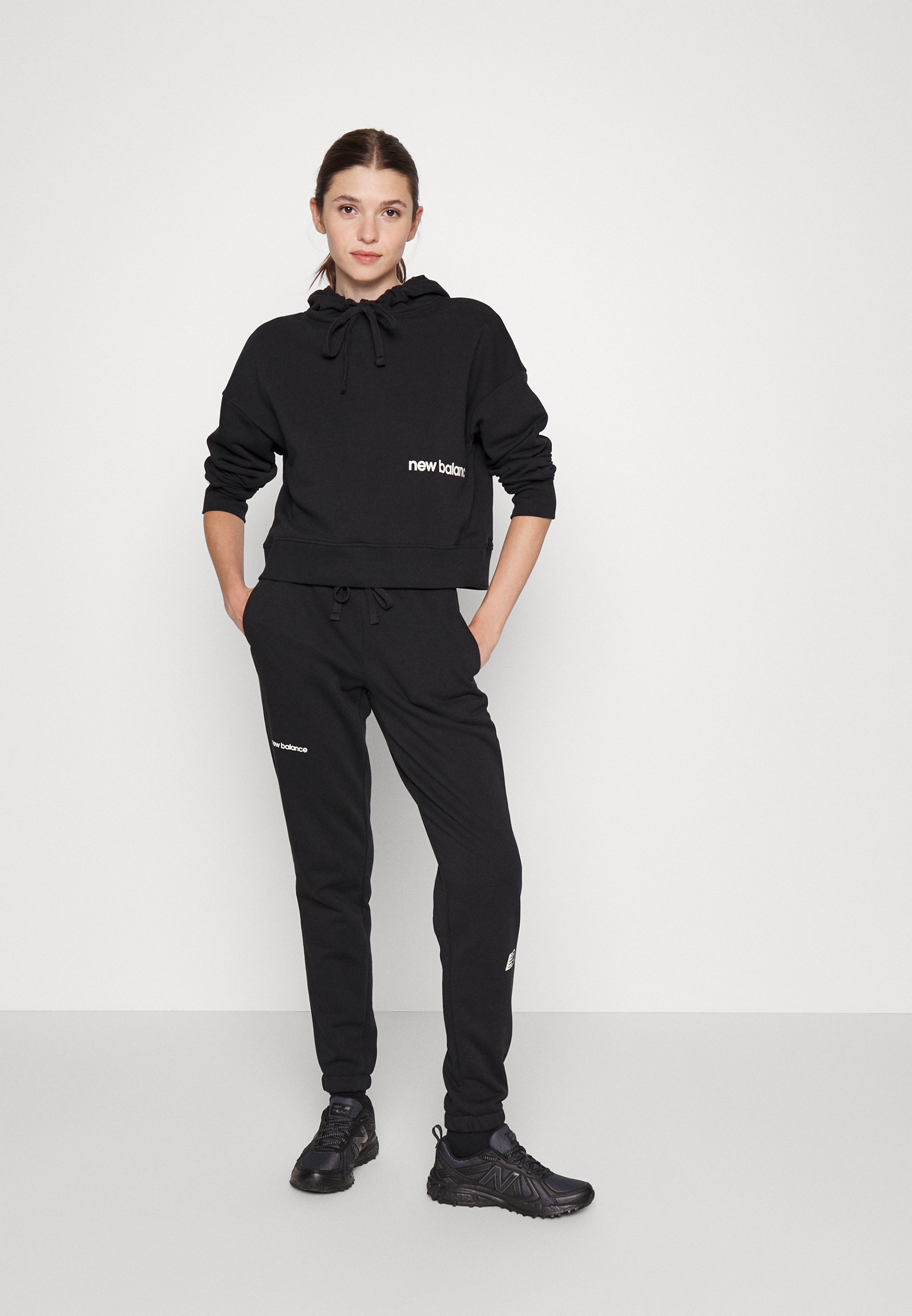 NB ESSENTIALS  - Tracksuit bottoms - black/black