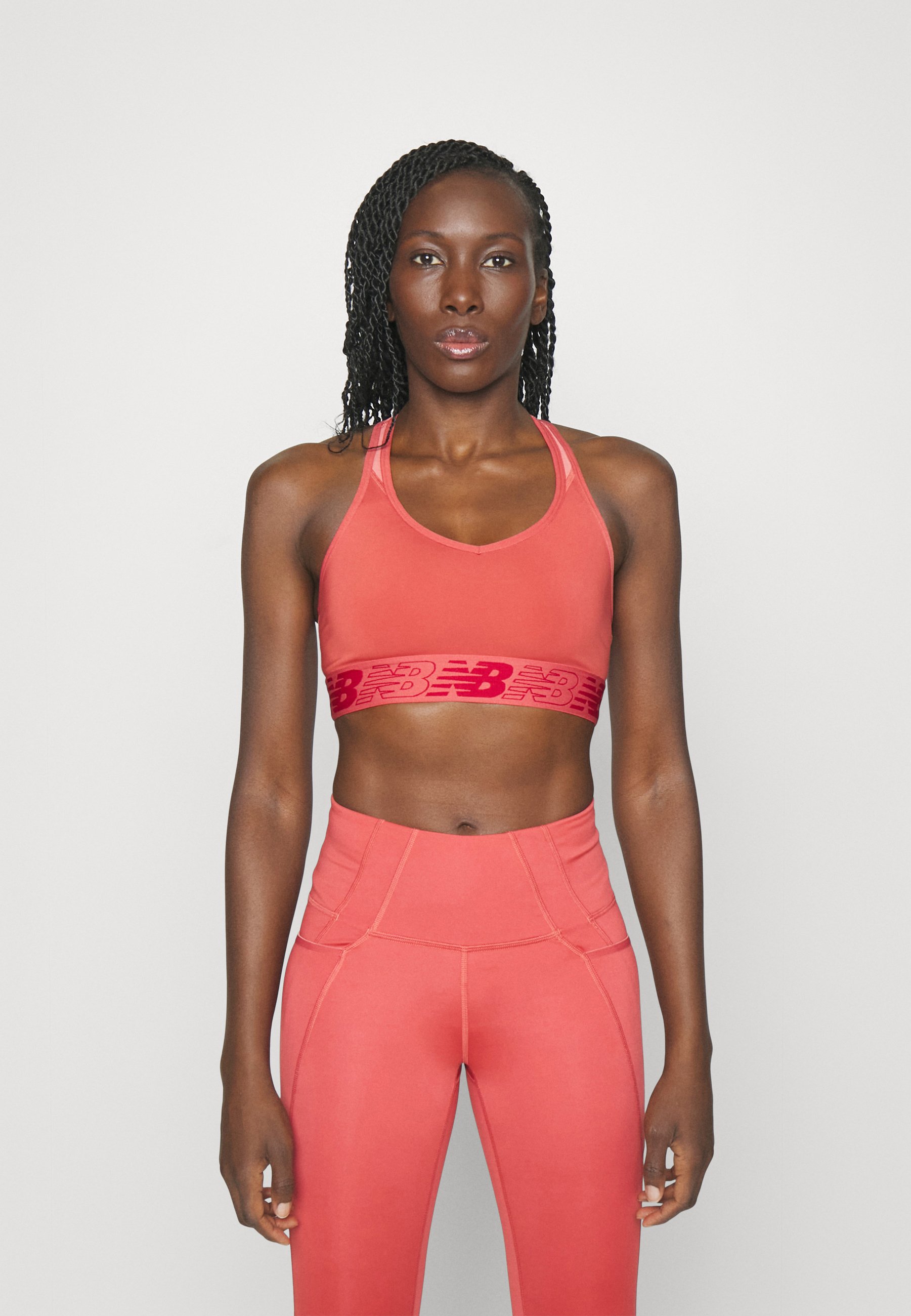 NB PACE BRA - Medium support sports bra - astro dust/coral