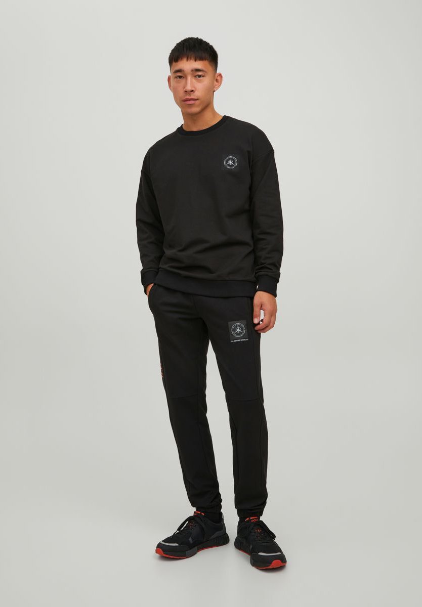 Jack &Jones JPSTWILL JJFILO - Tracksuit bottoms - black