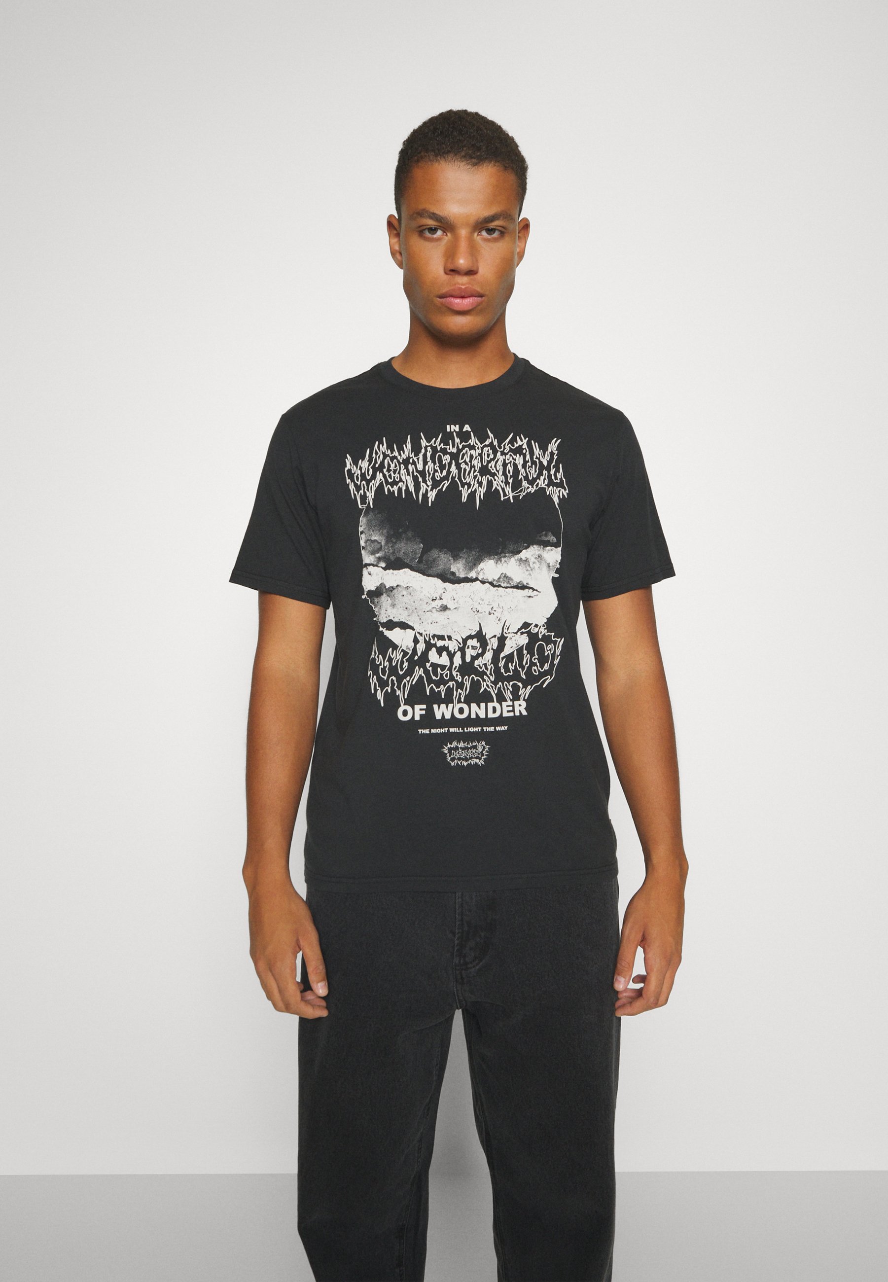 Levi's® RELAXED FIT TEE - Print T-shirt - caviar/black