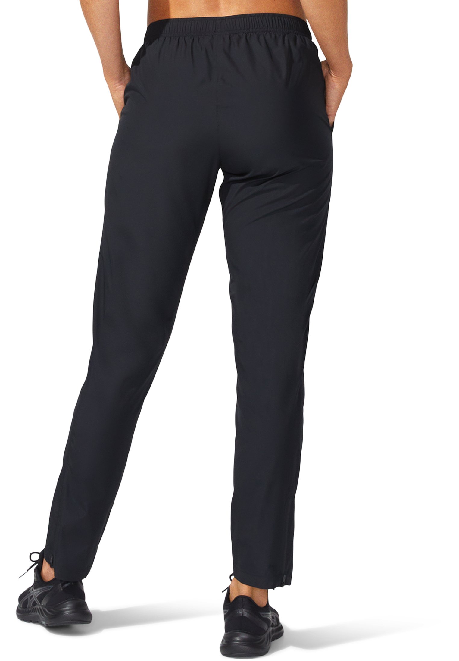 ASICS CORE WOVEN PANT - Tracksuit bottoms - performance black/black
