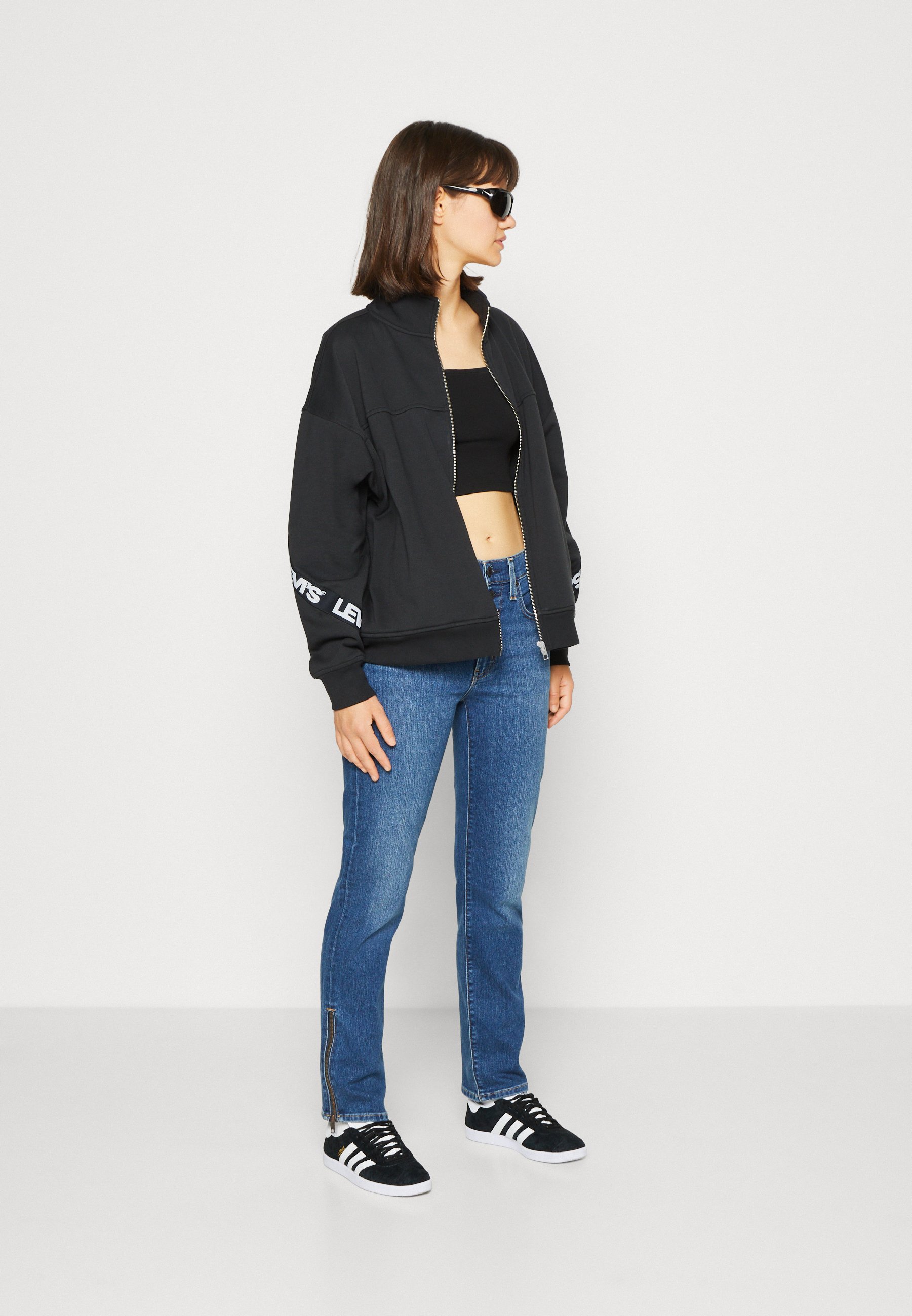 Levi's® TAPED FLEX ZIP - Zip-up sweatshirt - black