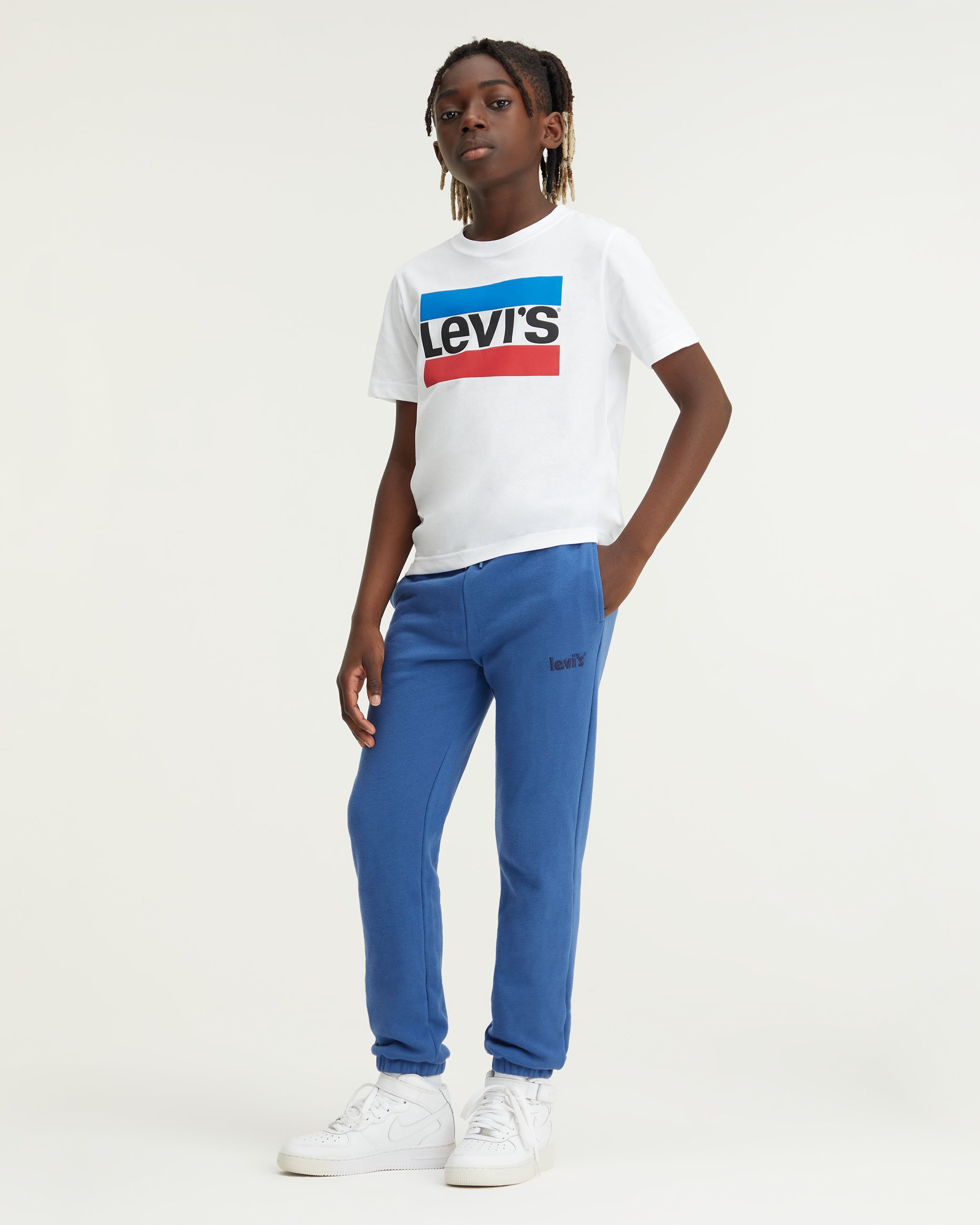 Levi's® POSTER LOGO RELAXED JOGGER - Tracksuit bottoms - true navy/dark blue