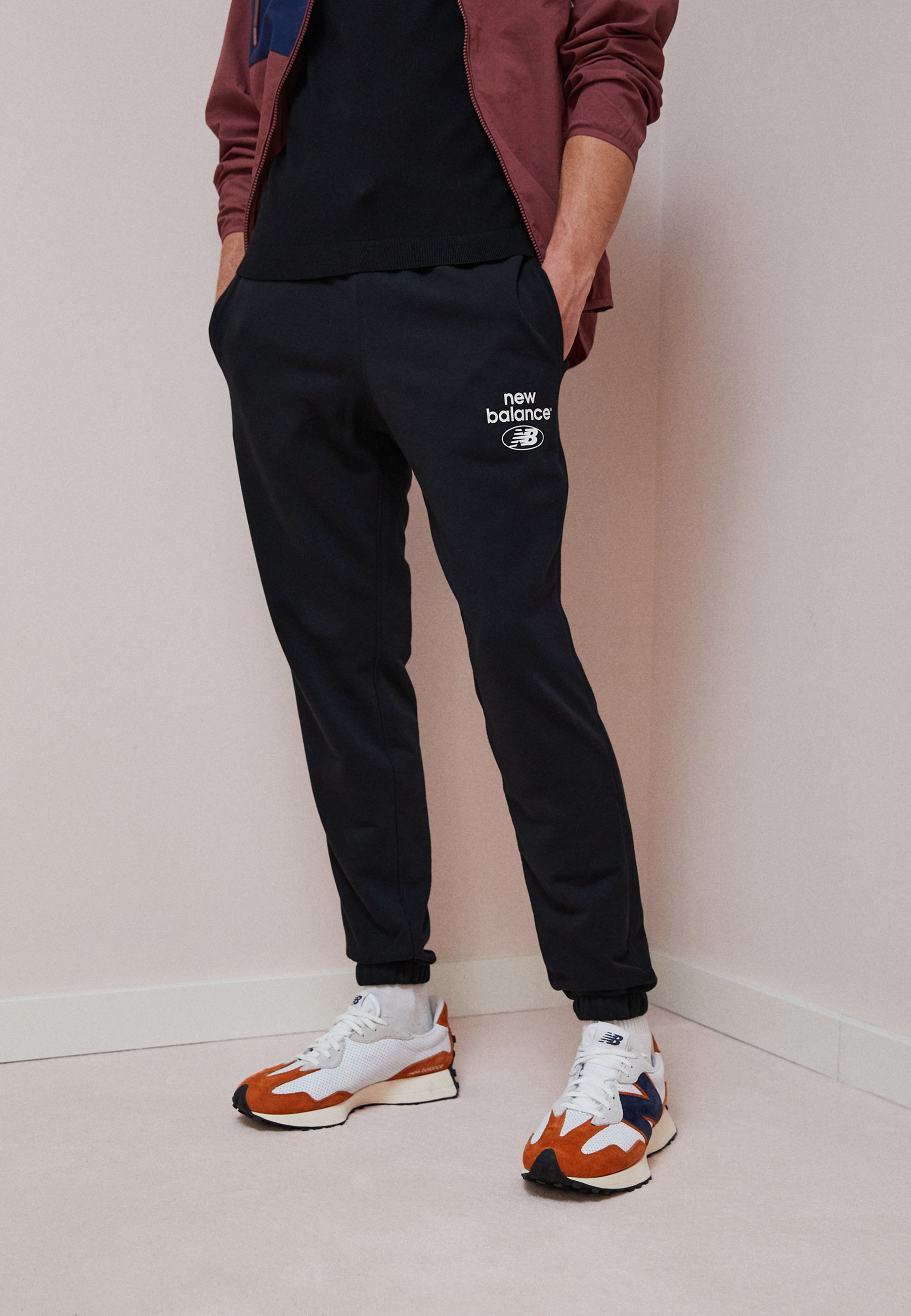 NB ESSENTIALS  - Tracksuit bottoms - black