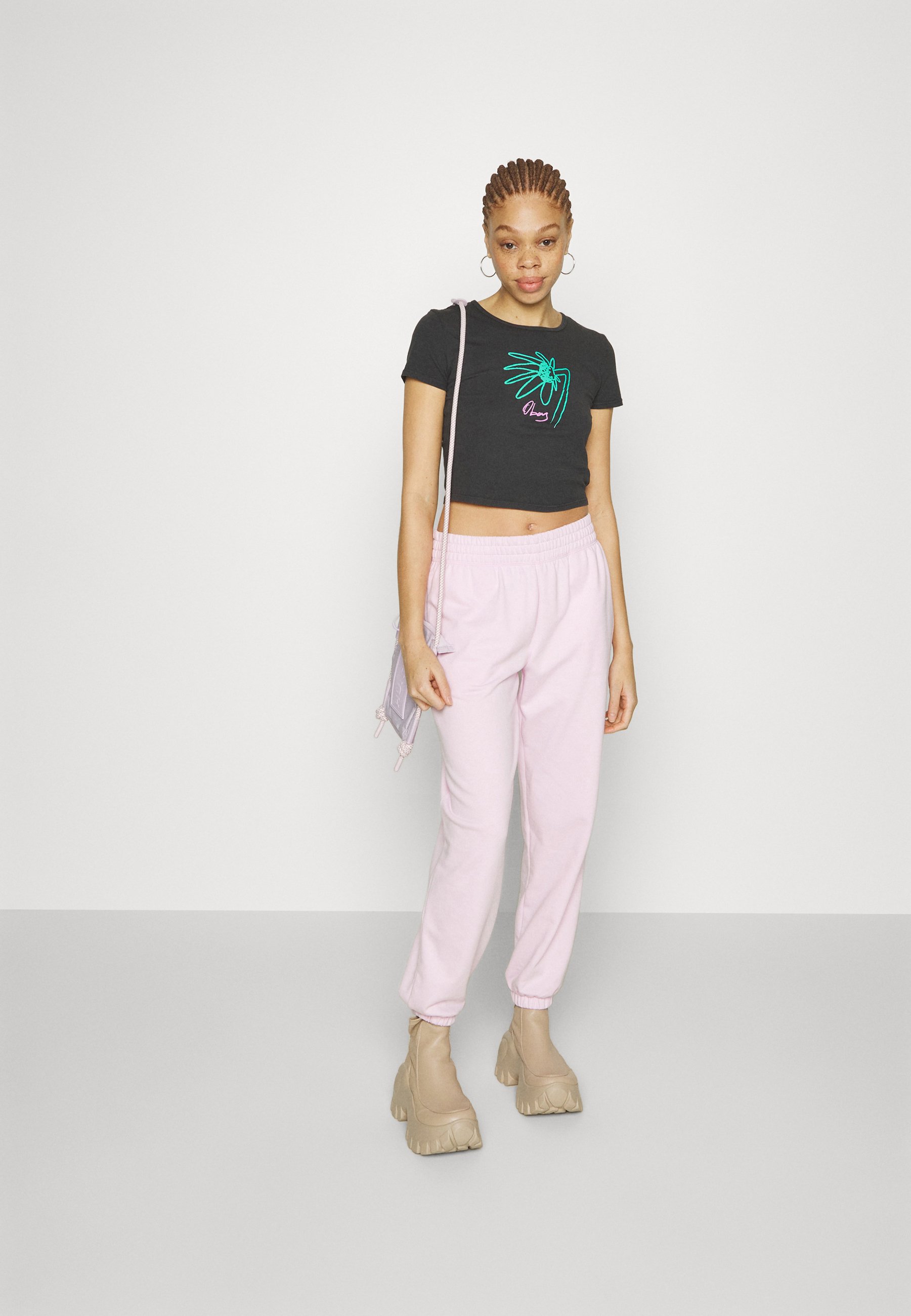 NB SPORT FASHION PANT - Tracksuit bottoms - light raspberry/pink
