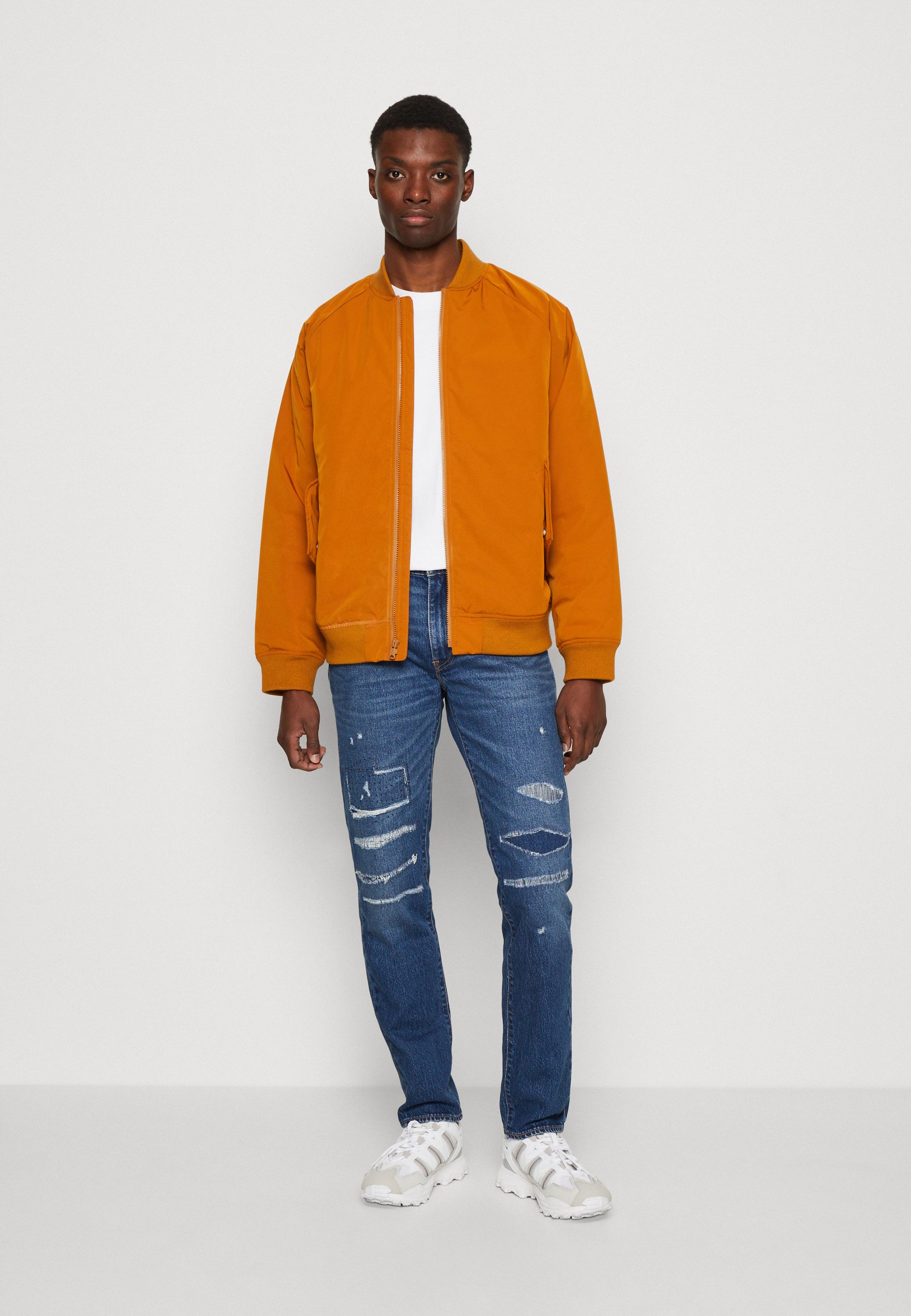 Levi's® 511™ SLIM - Slim fit jeans - witches butter/blue denim