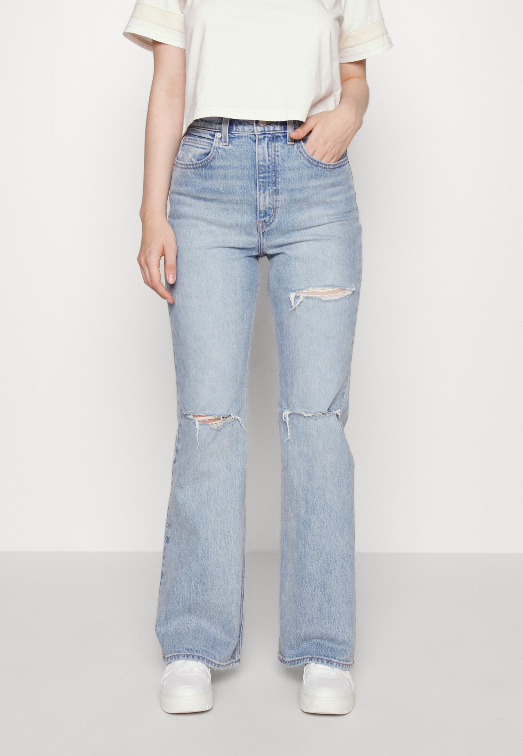 Levi's® 70S HIGH FLARE - Flared Jeans - light indigo destructed/destroyed denim