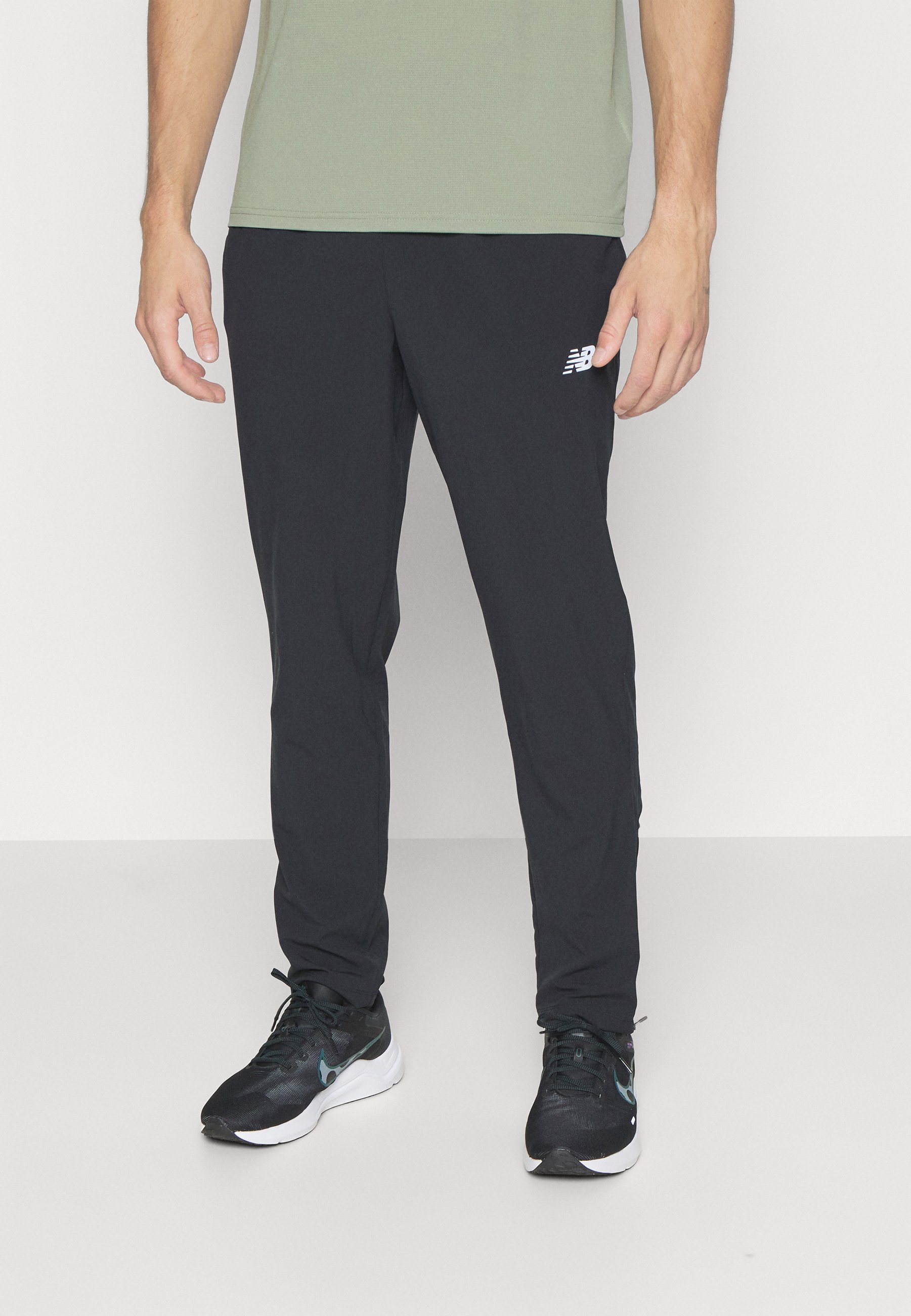 NB ACCELERATE PANT - Tracksuit bottoms - black