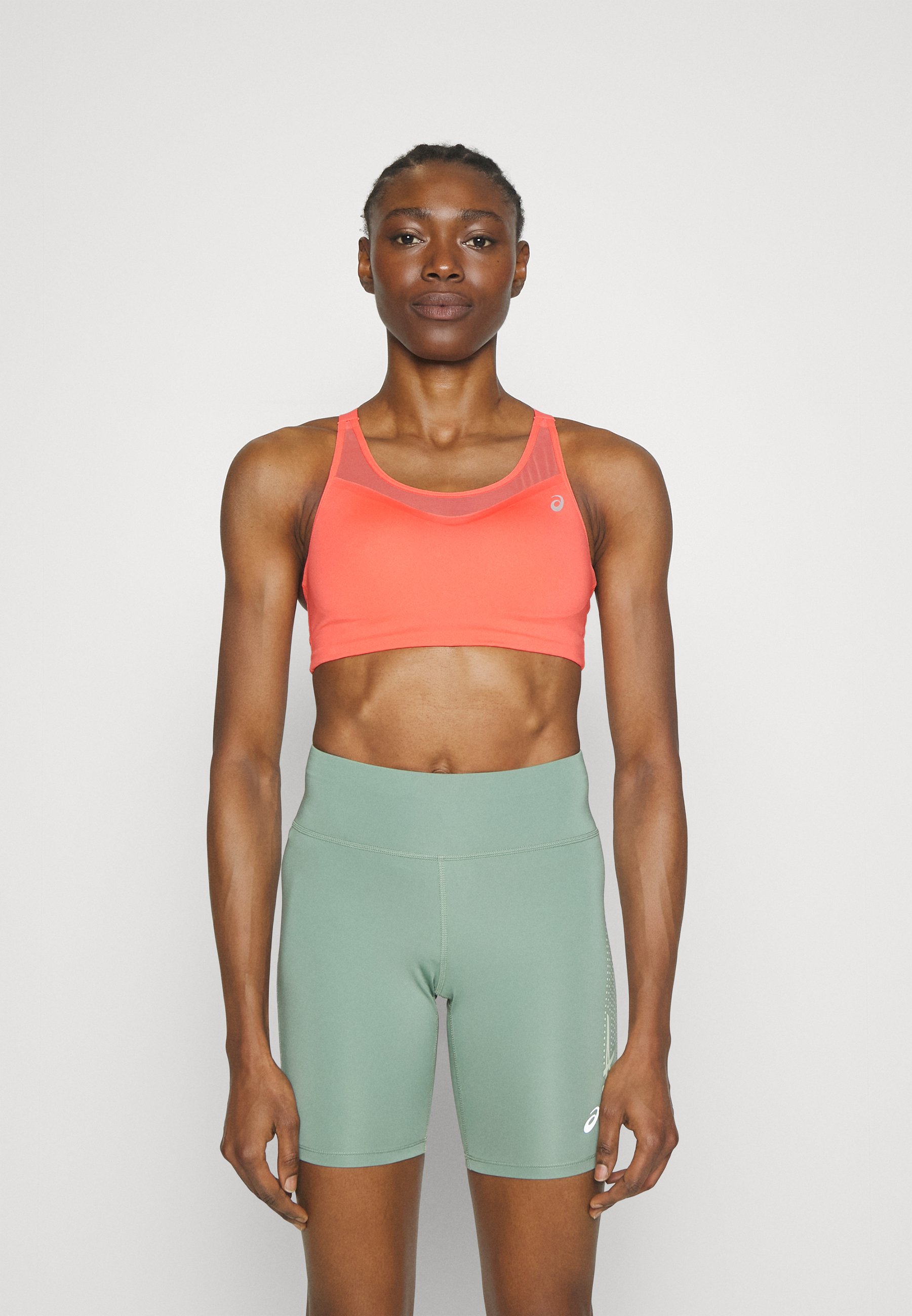 ASICS ACCELERATE - Medium support sports bra - papaya/coral