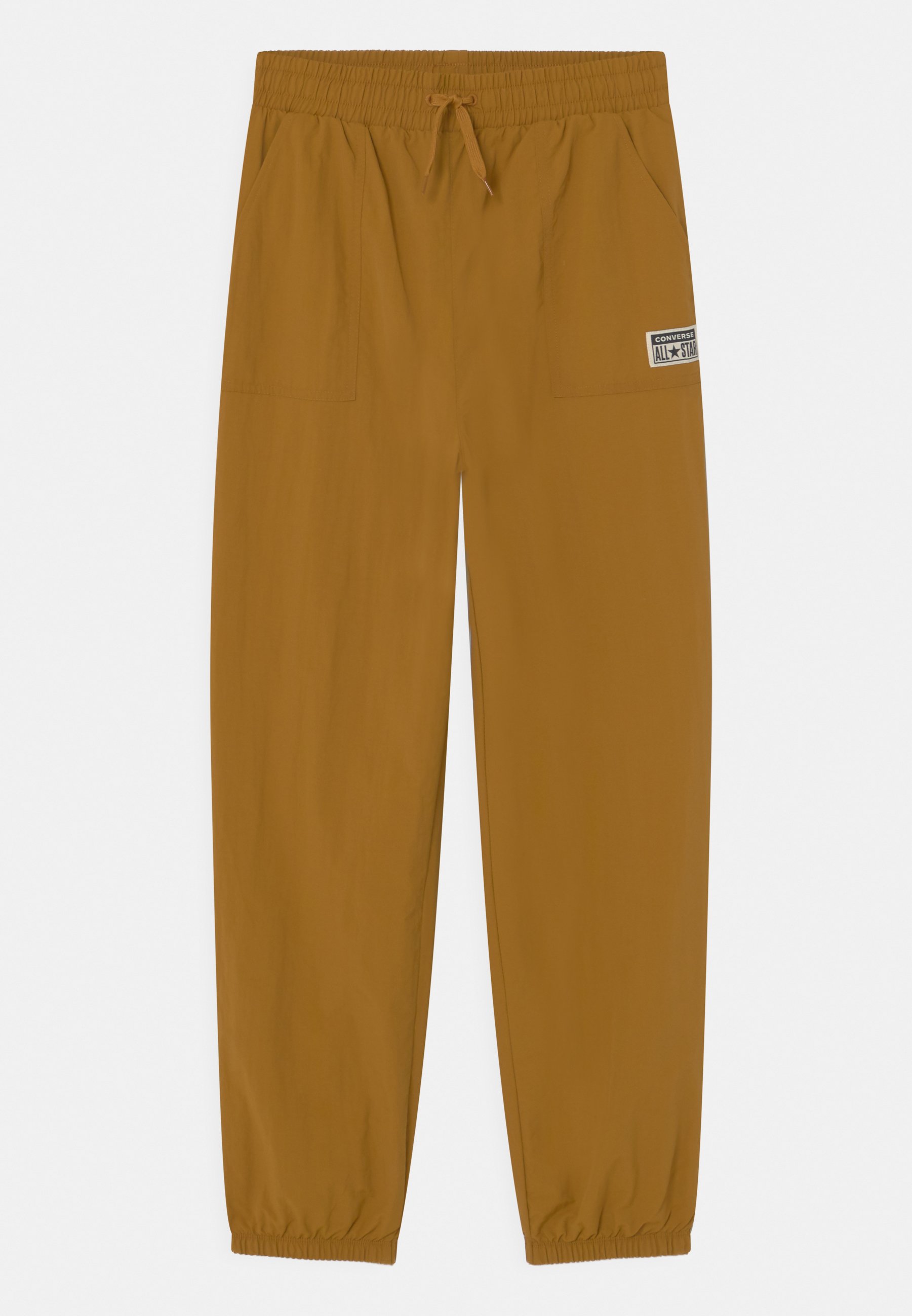 Converse WOVEN UNISEX - Tracksuit bottoms - dark soba/mustard yellow