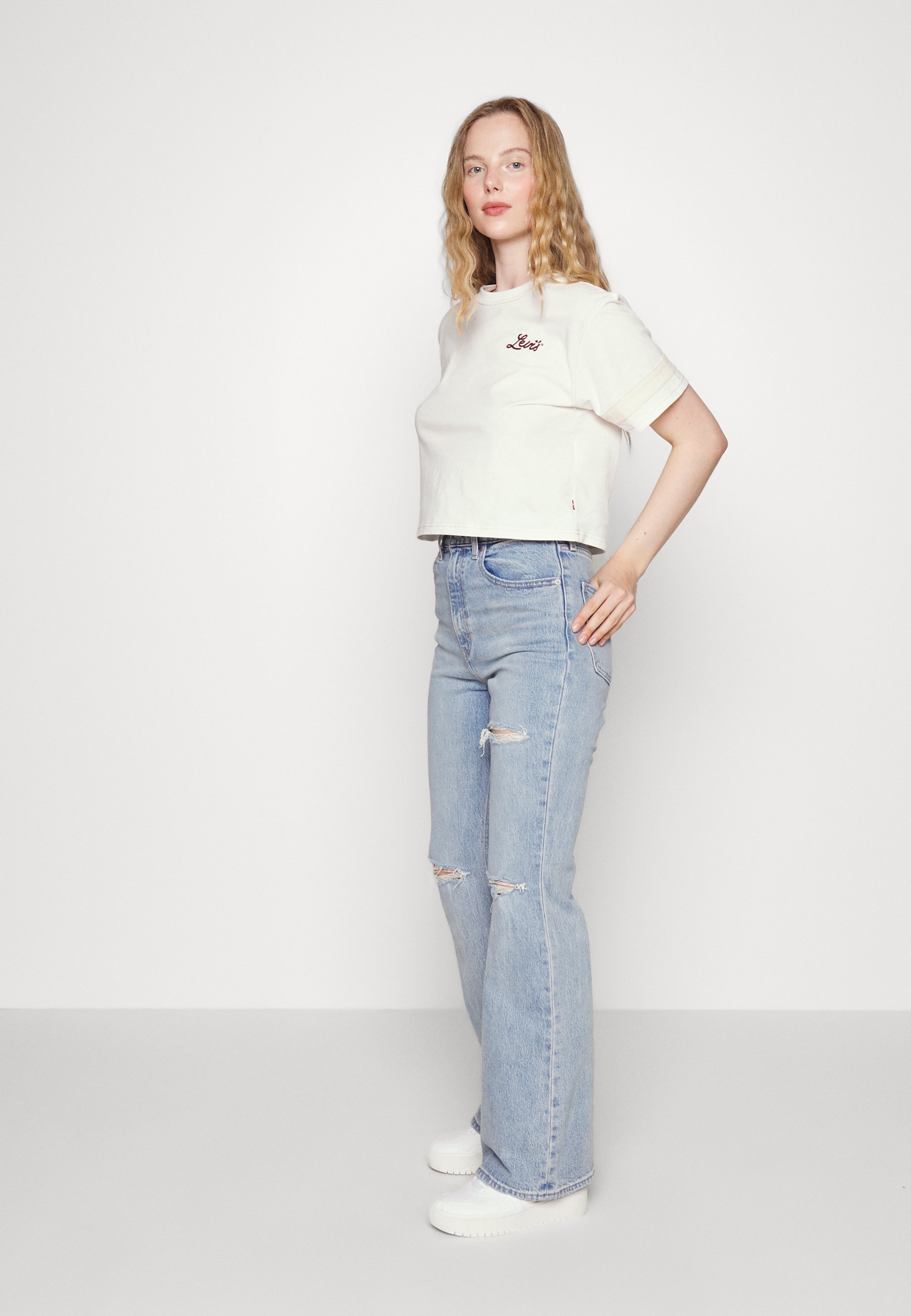 Levi's® 70S HIGH FLARE - Flared Jeans - light indigo destructed/destroyed denim