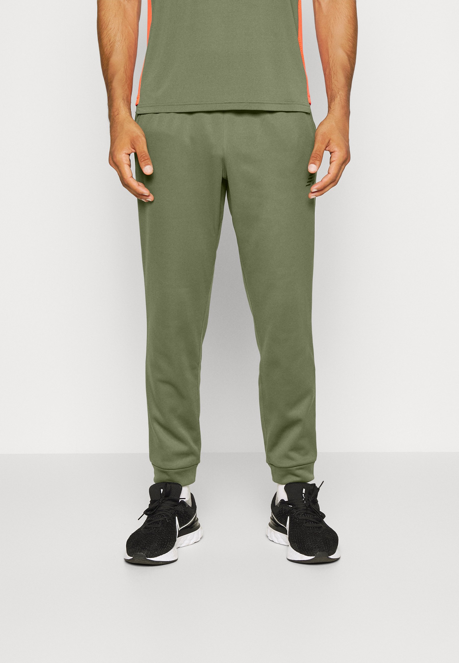 NB TENACITY PERFORMANCE - Tracksuit bottoms - deep olive green/olive