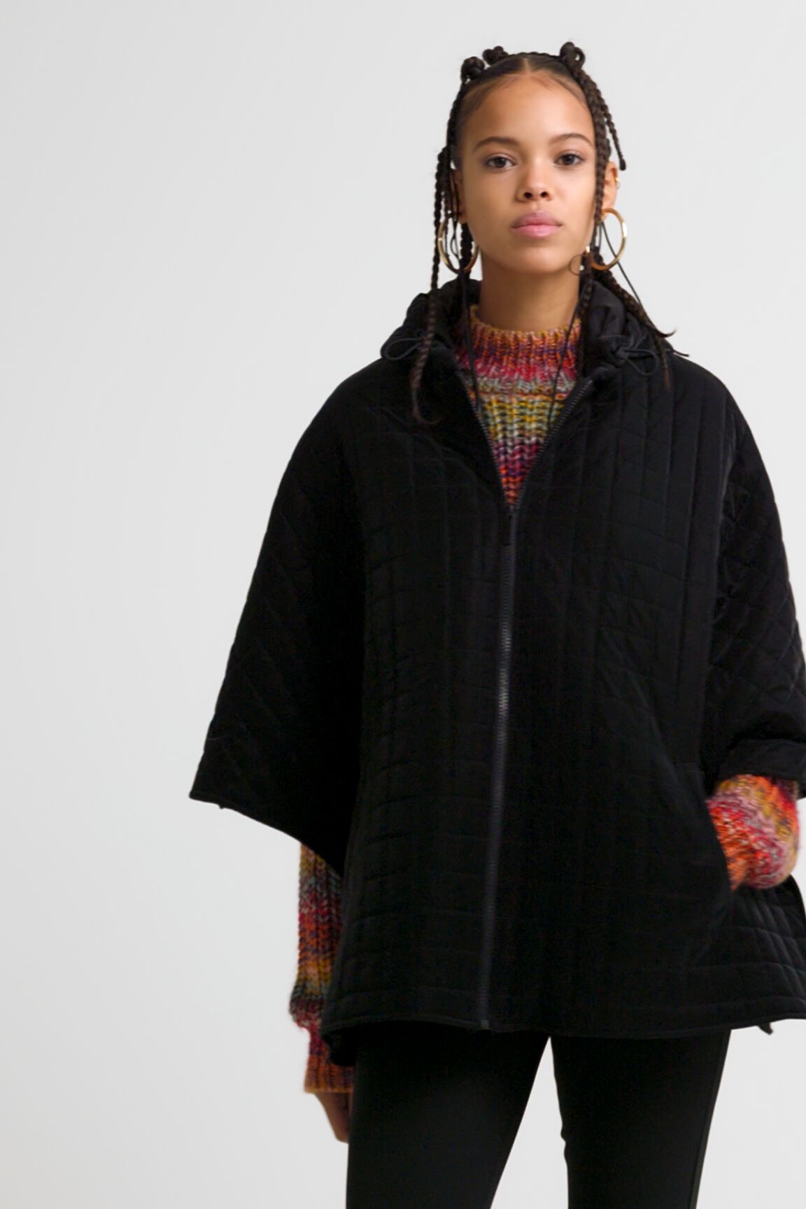 Poncho acolchado capucha