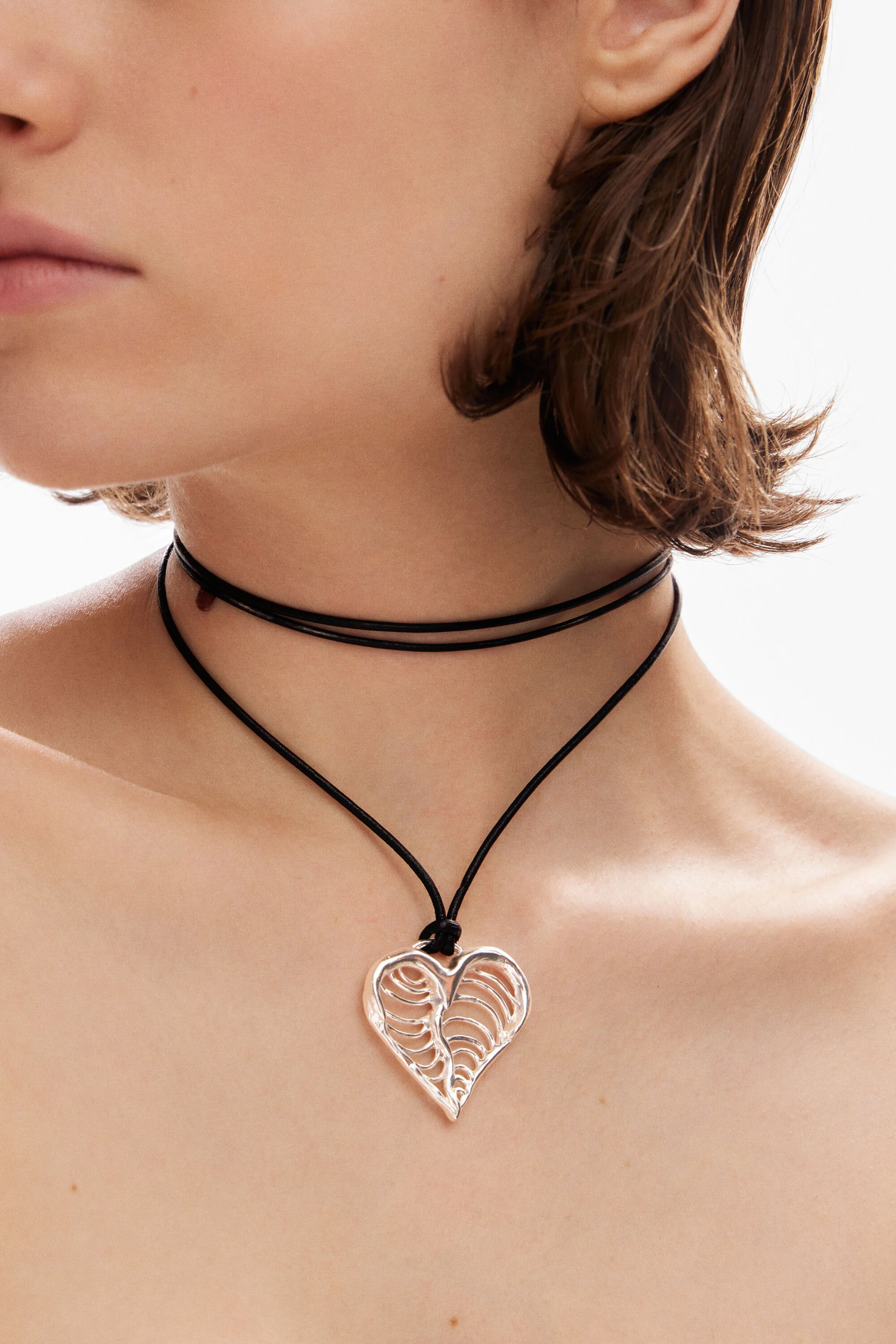 Colgante coraz&oacute;n cord&oacute;n ba&ntilde;o plata Zalio