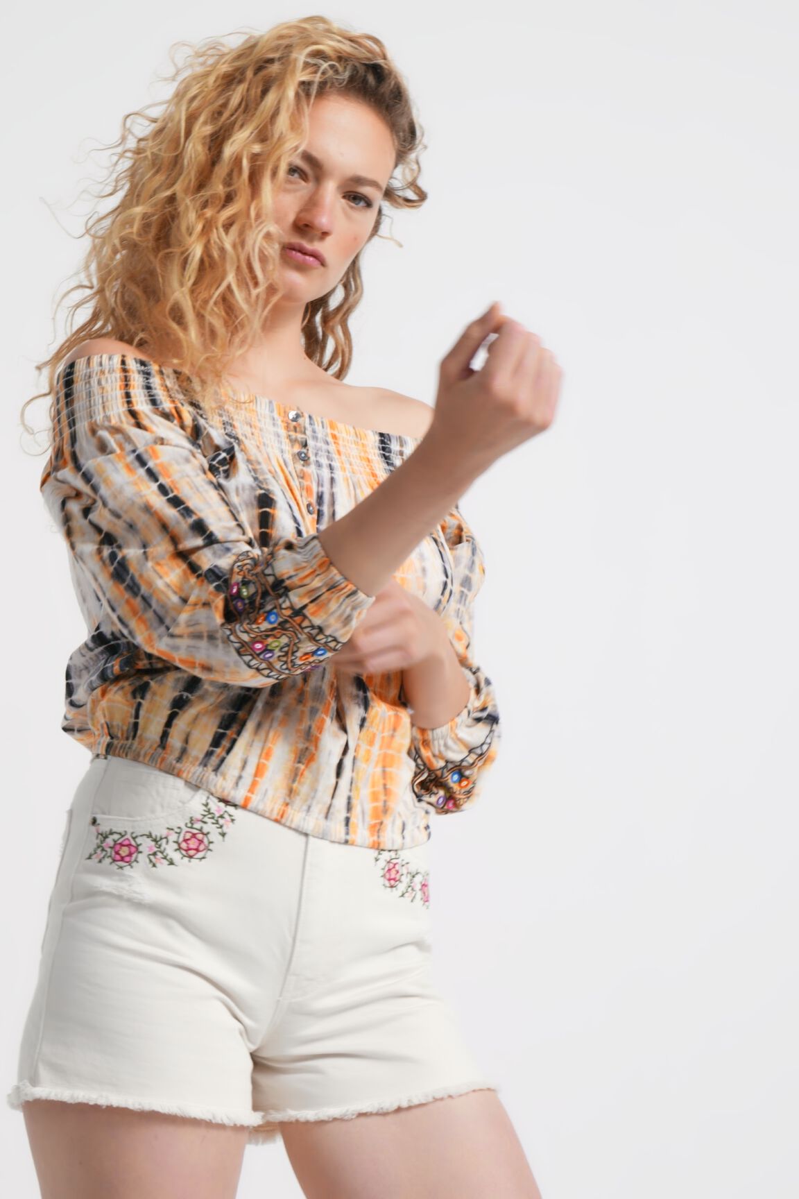 Blusa cuello de barco