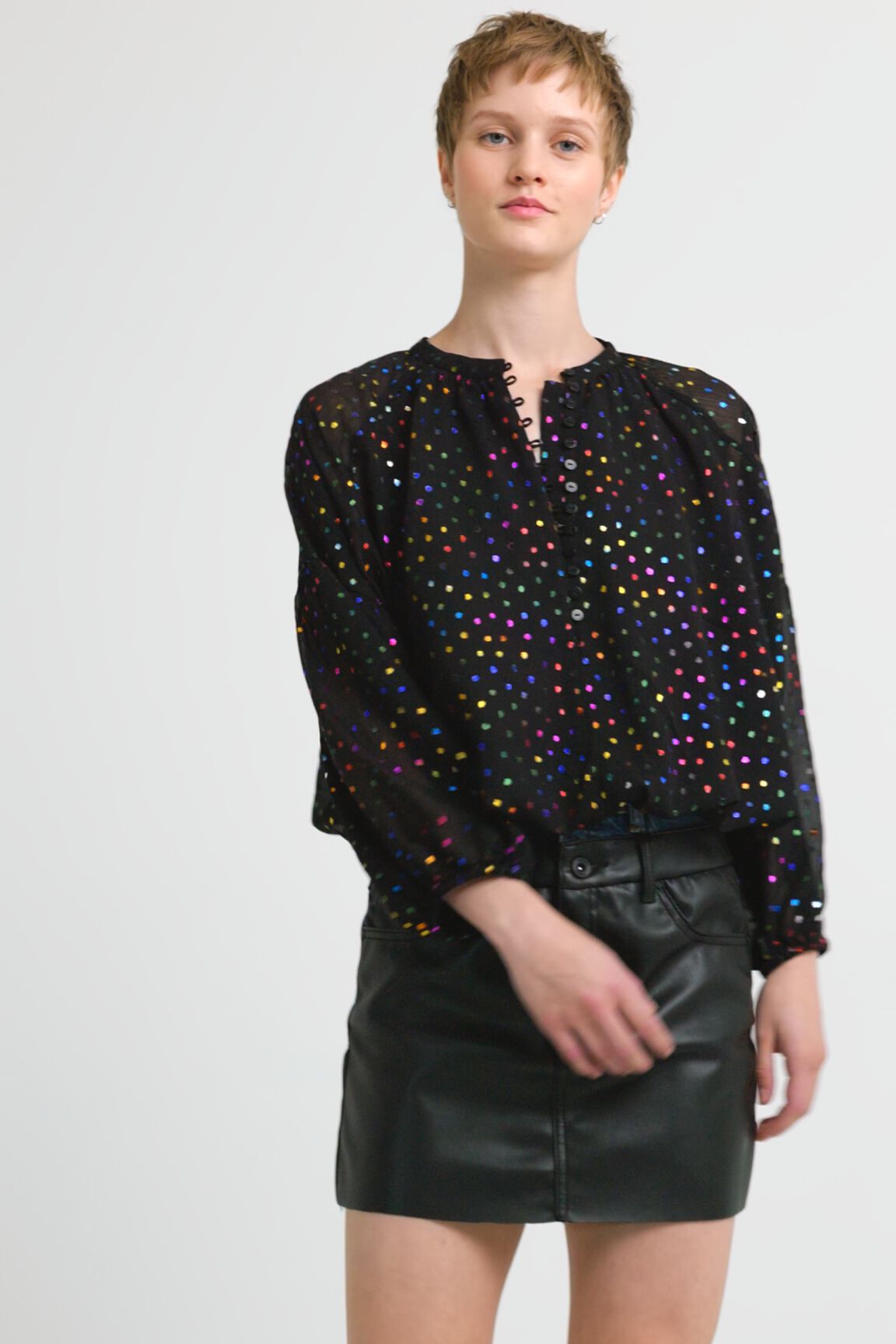 Blusa topos metalizados