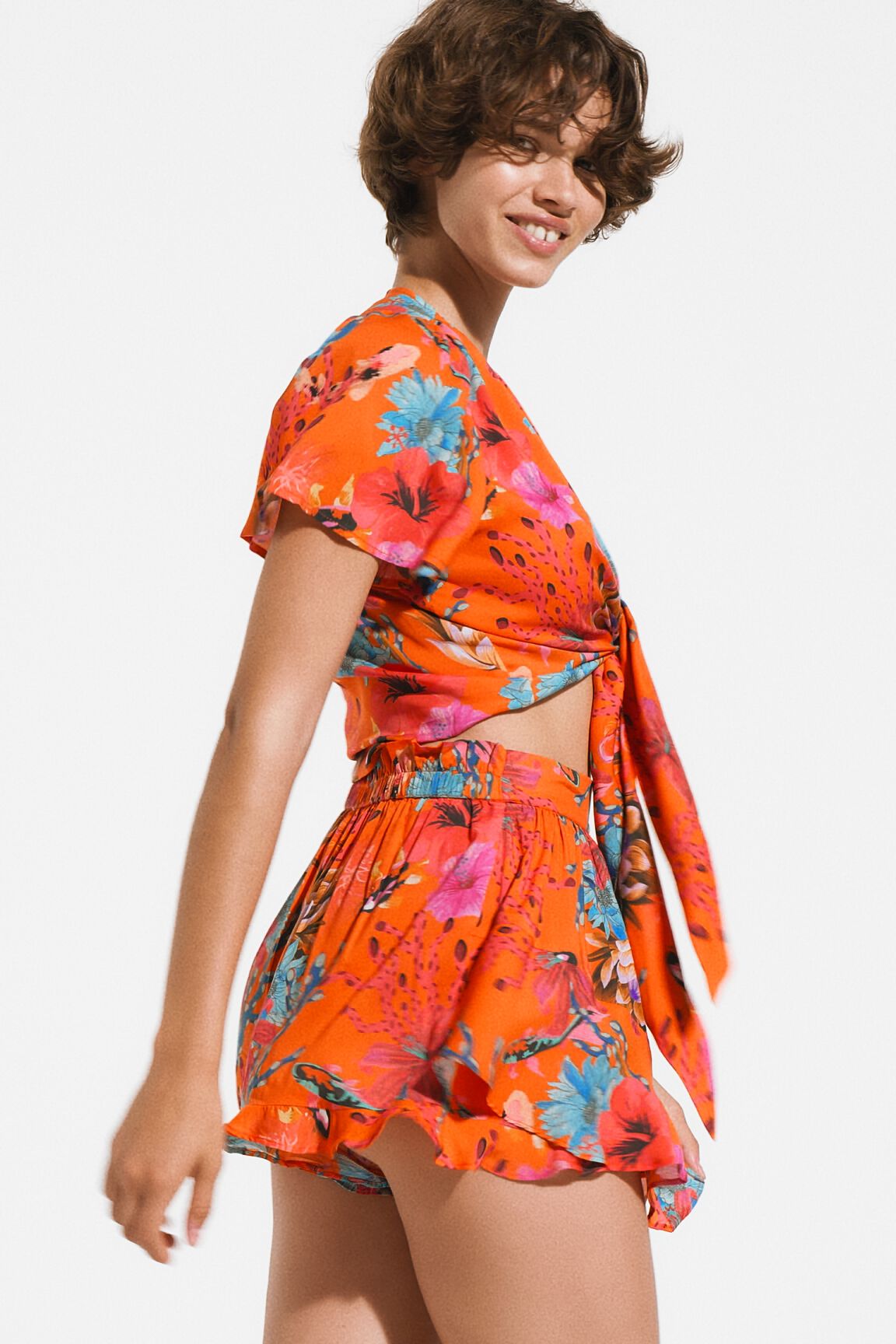 Blusa anudada corales