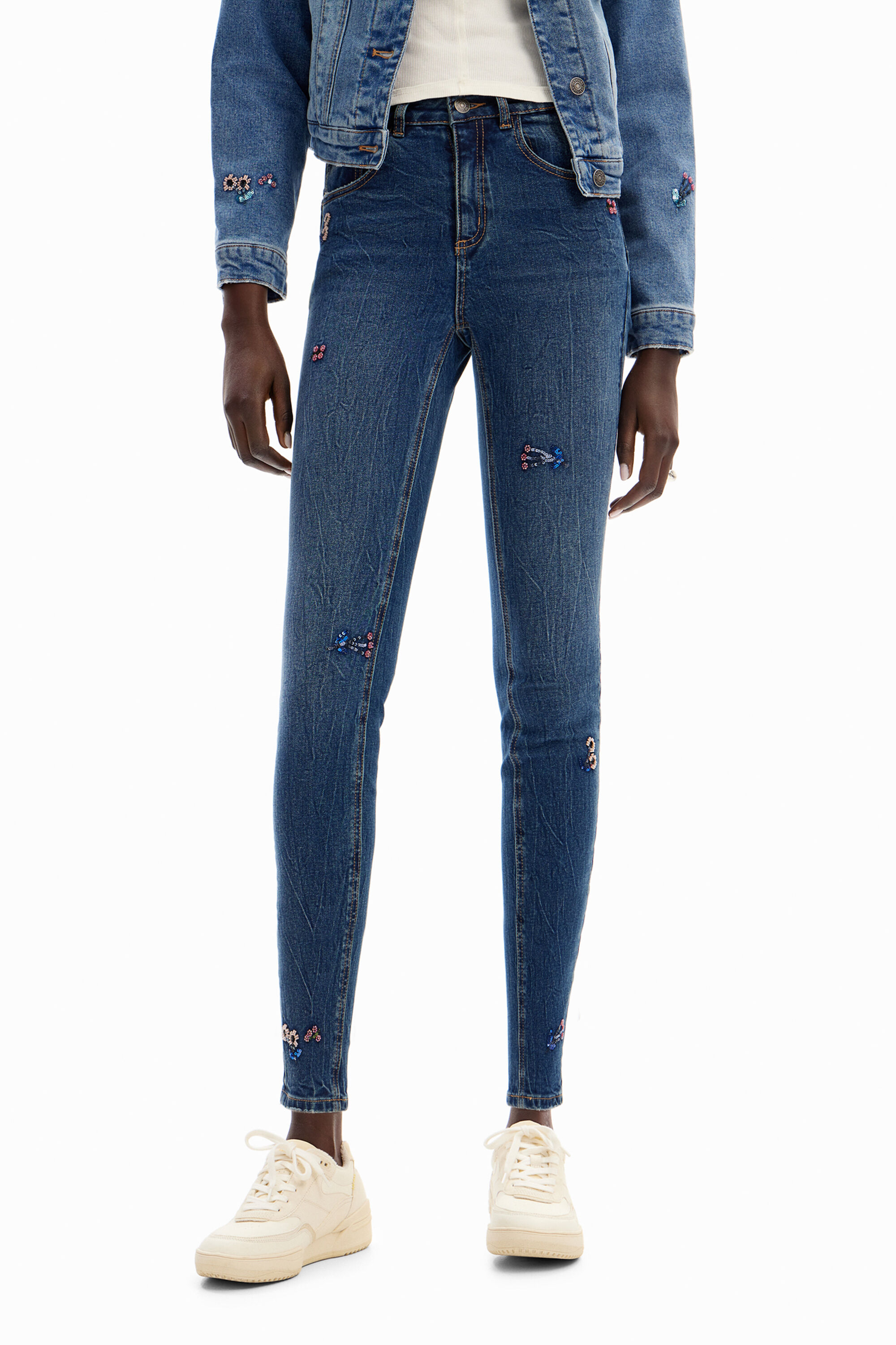 Vaqueros Slim abalorios flores