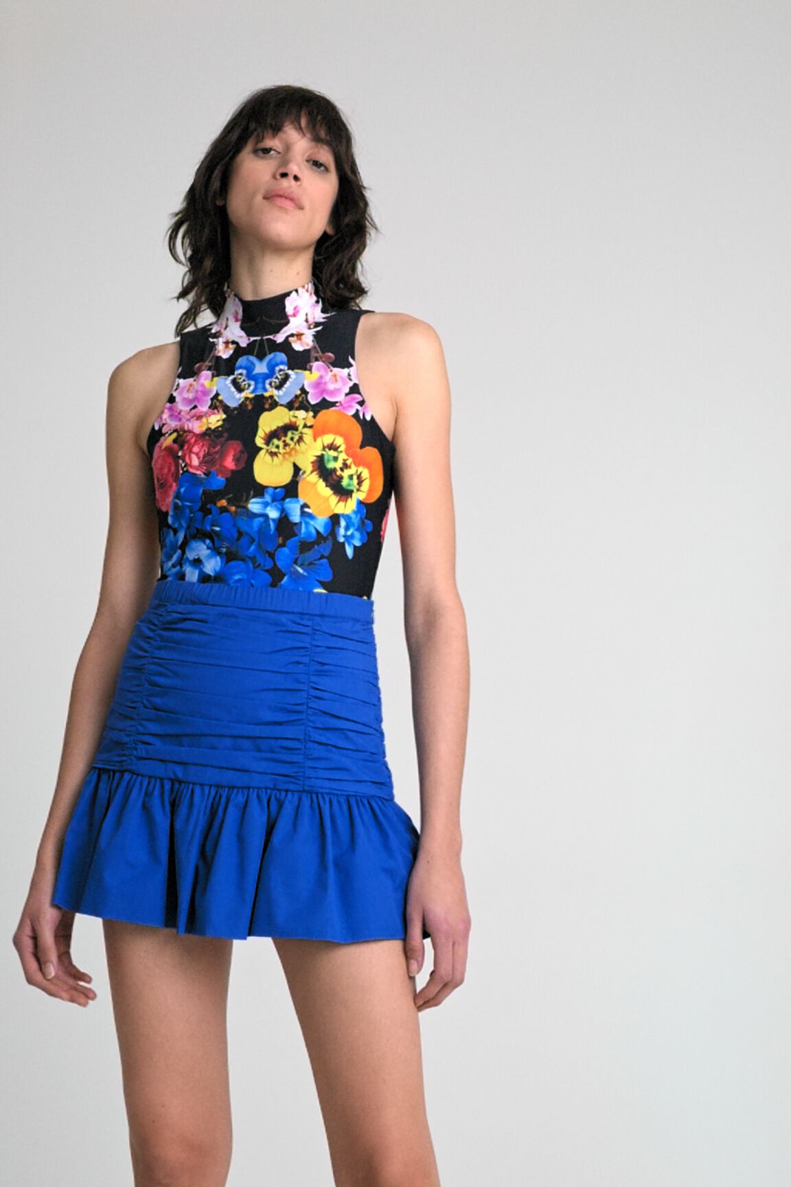 Minifalda drapeada volante