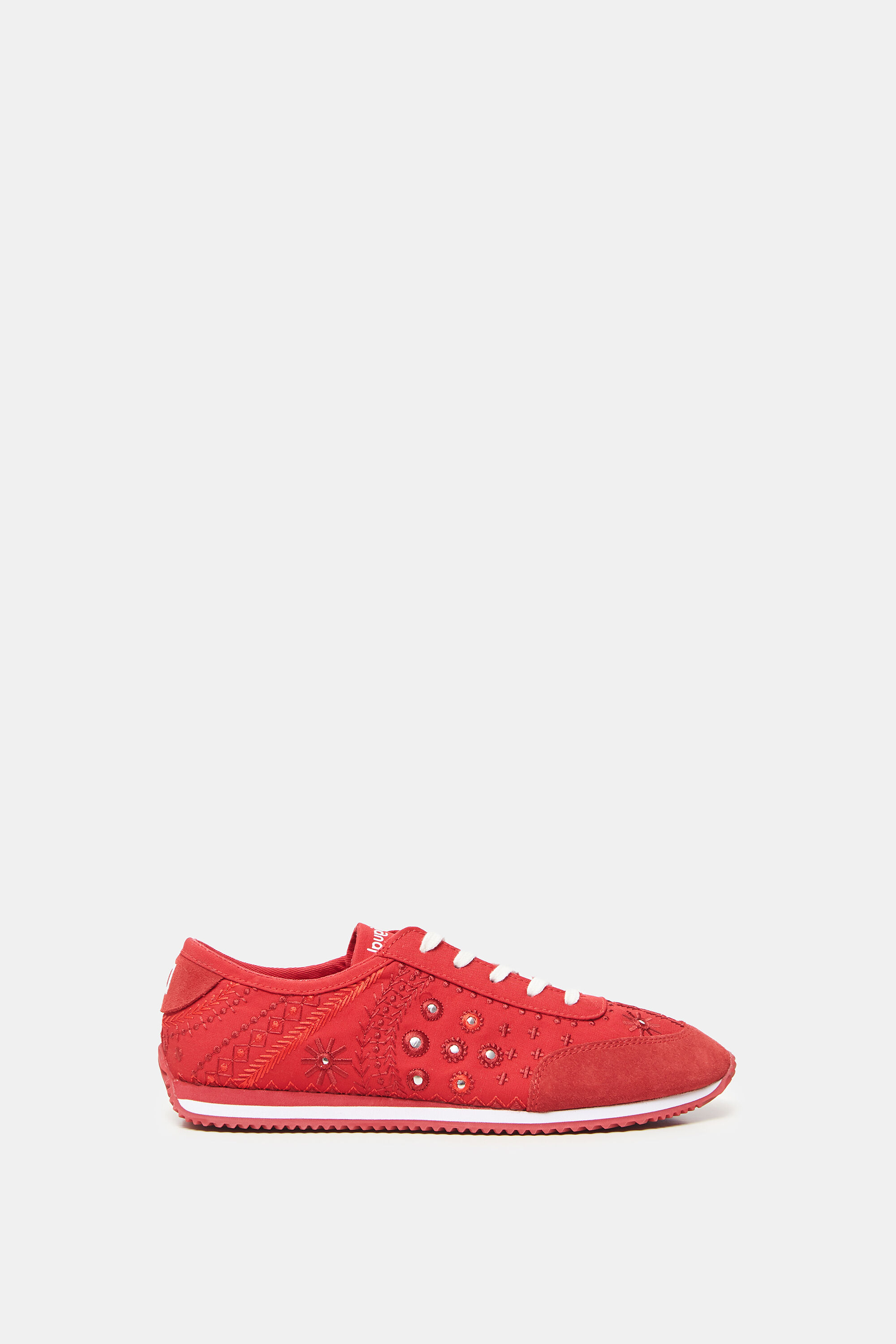 Zapatillas de piel bordadas